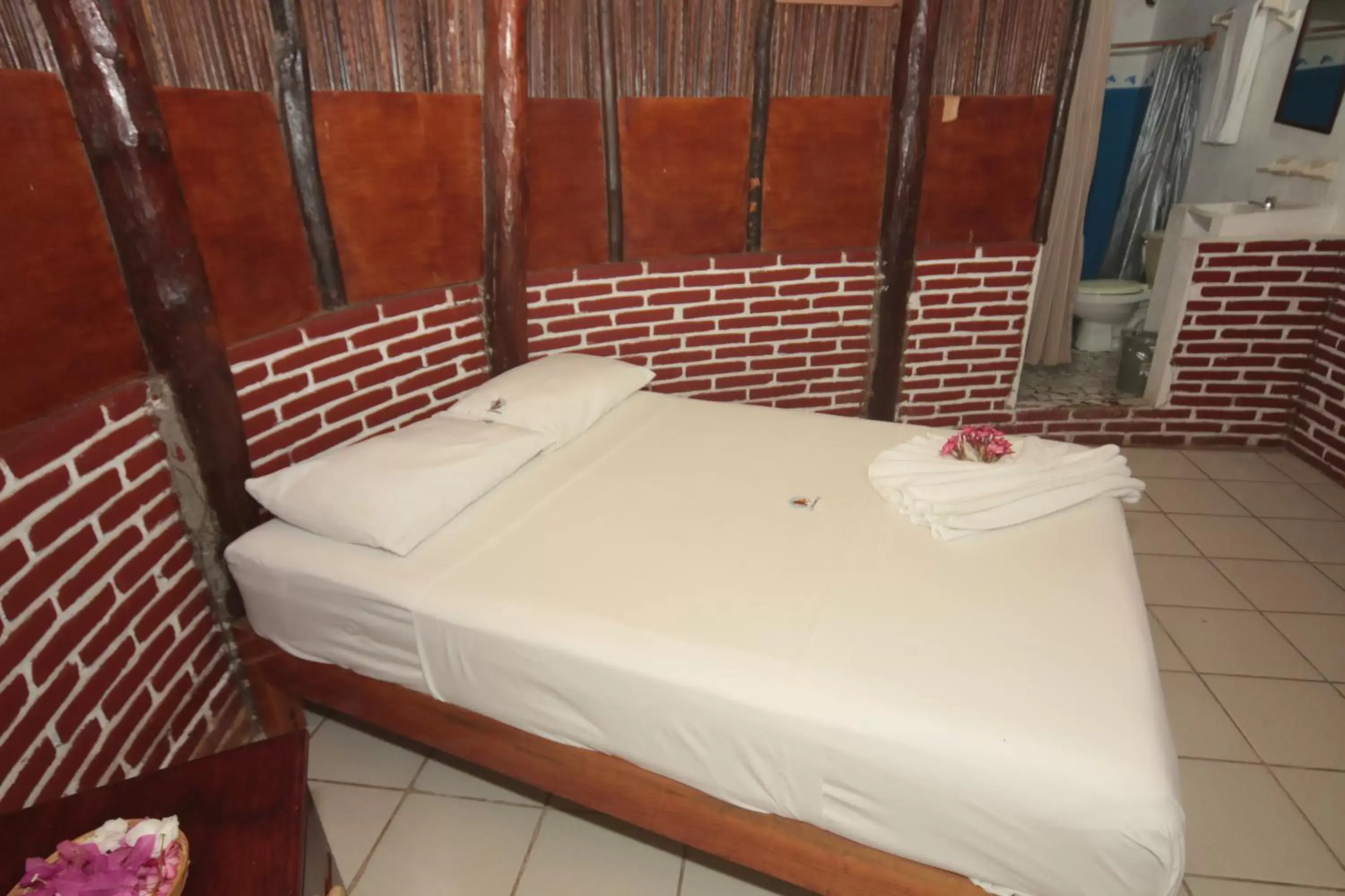 Bed in Hotel Bungalows Acuario