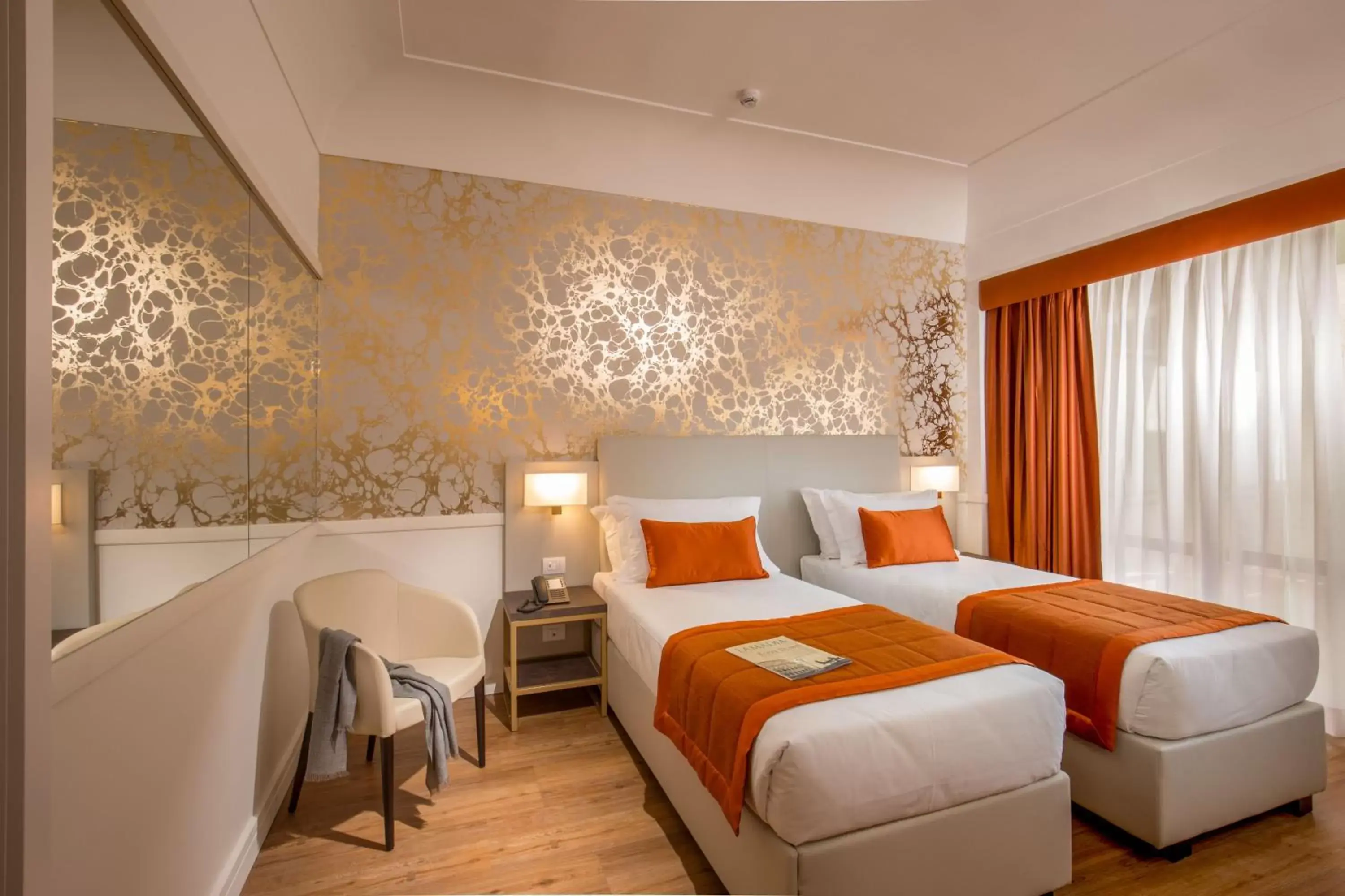 Bed in Hotel Shangri-La Roma by OMNIA hotels
