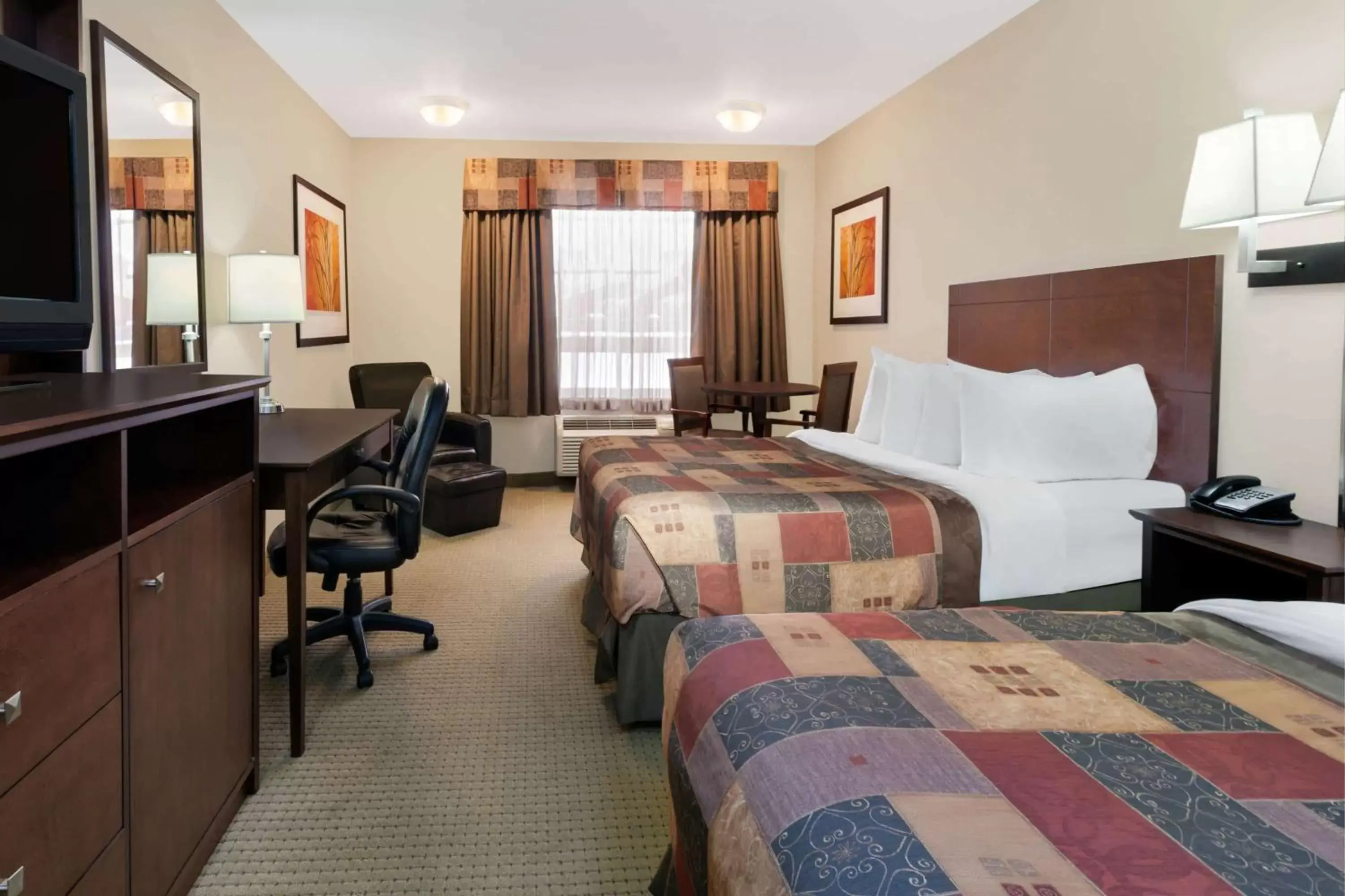 Photo of the whole room, Bed in Ramada by Wyndham Weyburn Photo of the whole room, Bed in Ramada by Wyndham Weyburn