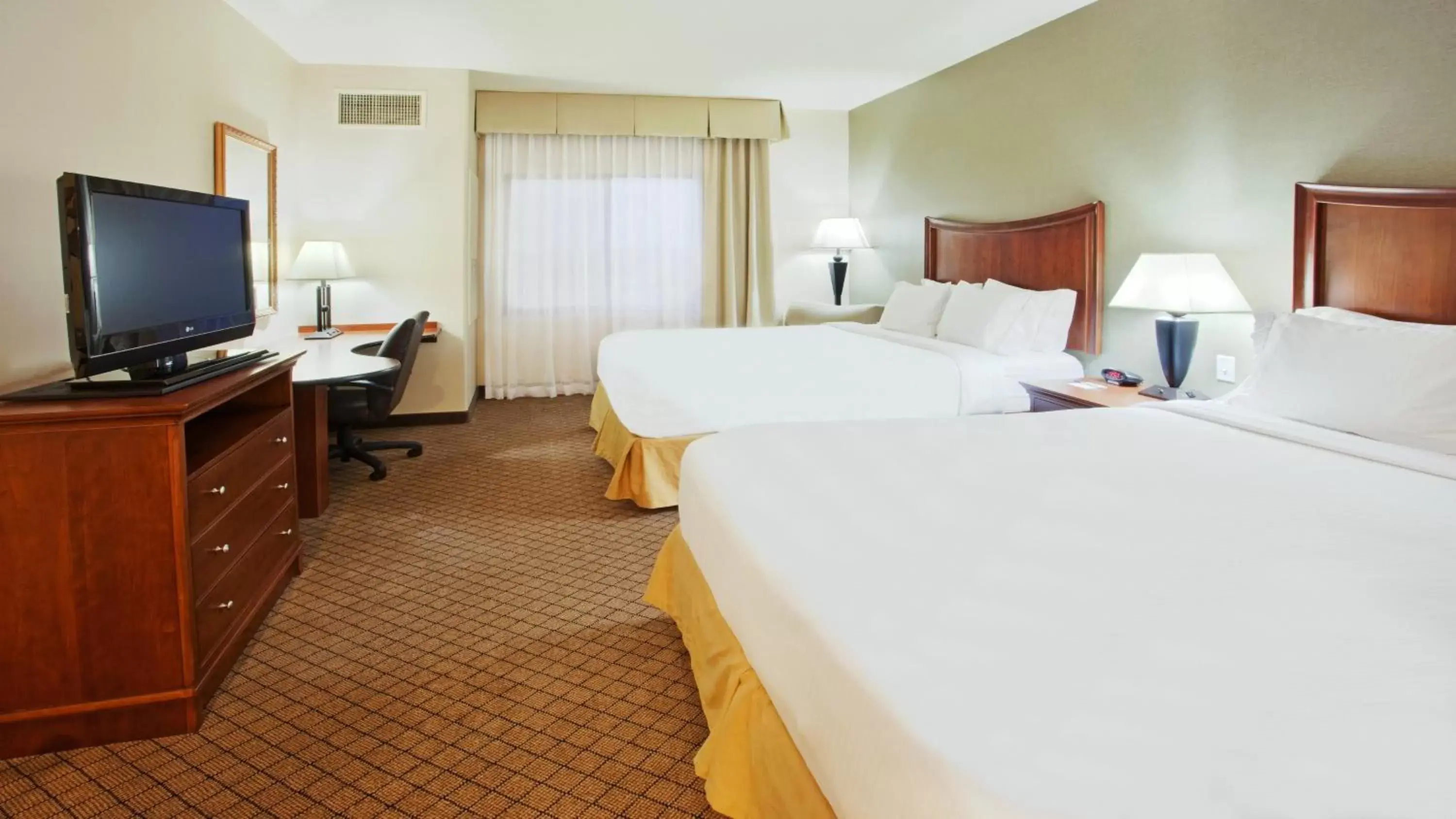 Photo of the whole room, TV/Entertainment Center in Holiday Inn Express Hotel & Suites Lincoln-Roseville Area, an IHG Hotel