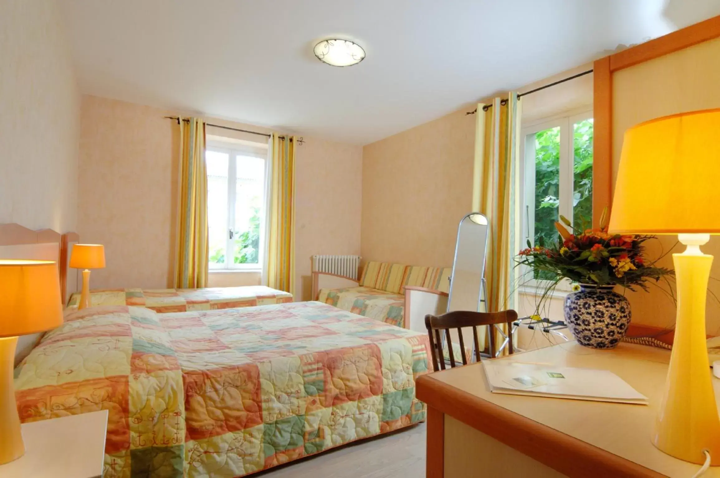 Bedroom in Le Logis Des Voyageurs