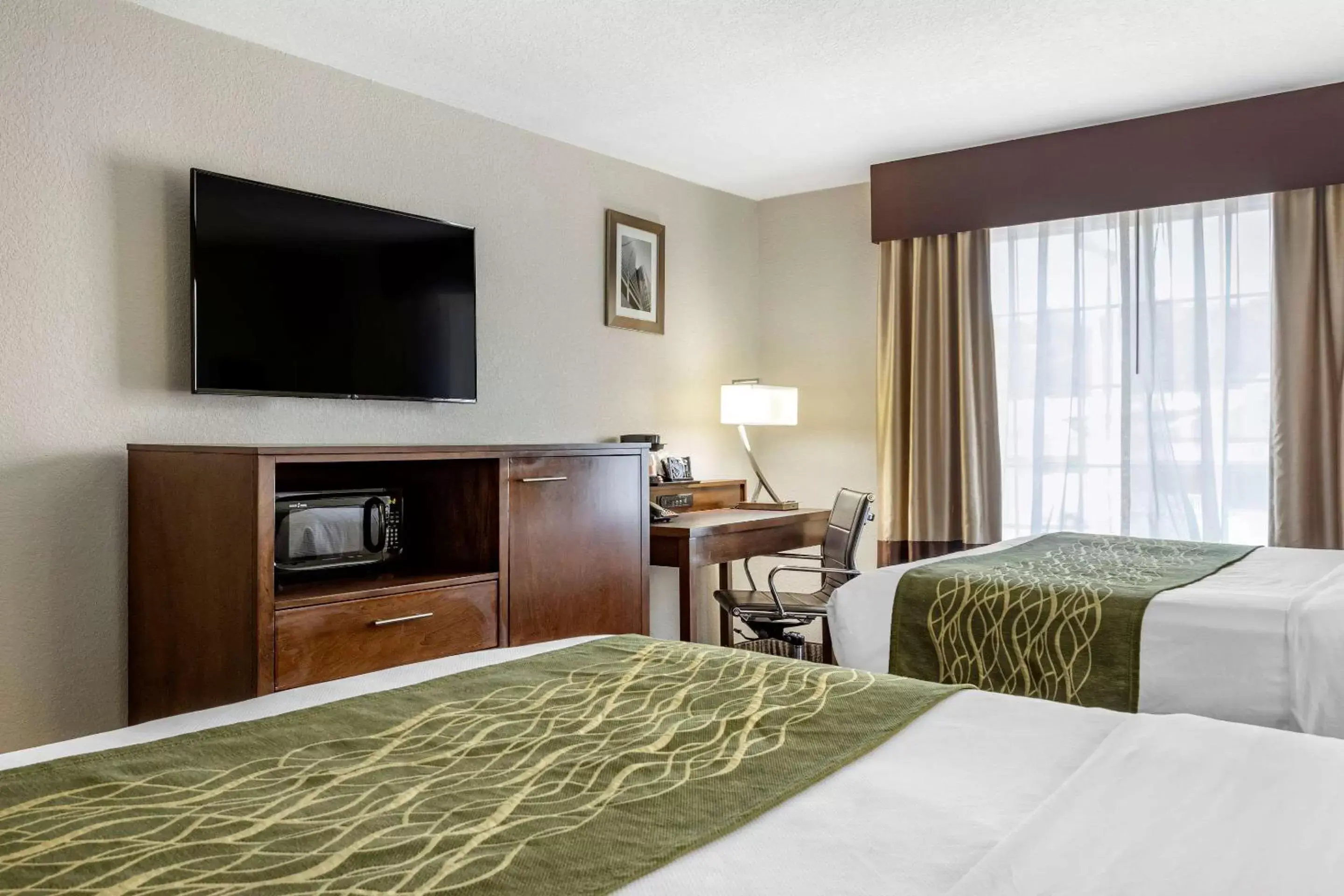 Photo of the whole room, Bed in Comfort Inn & Suites North Little Rock JFK Blvd