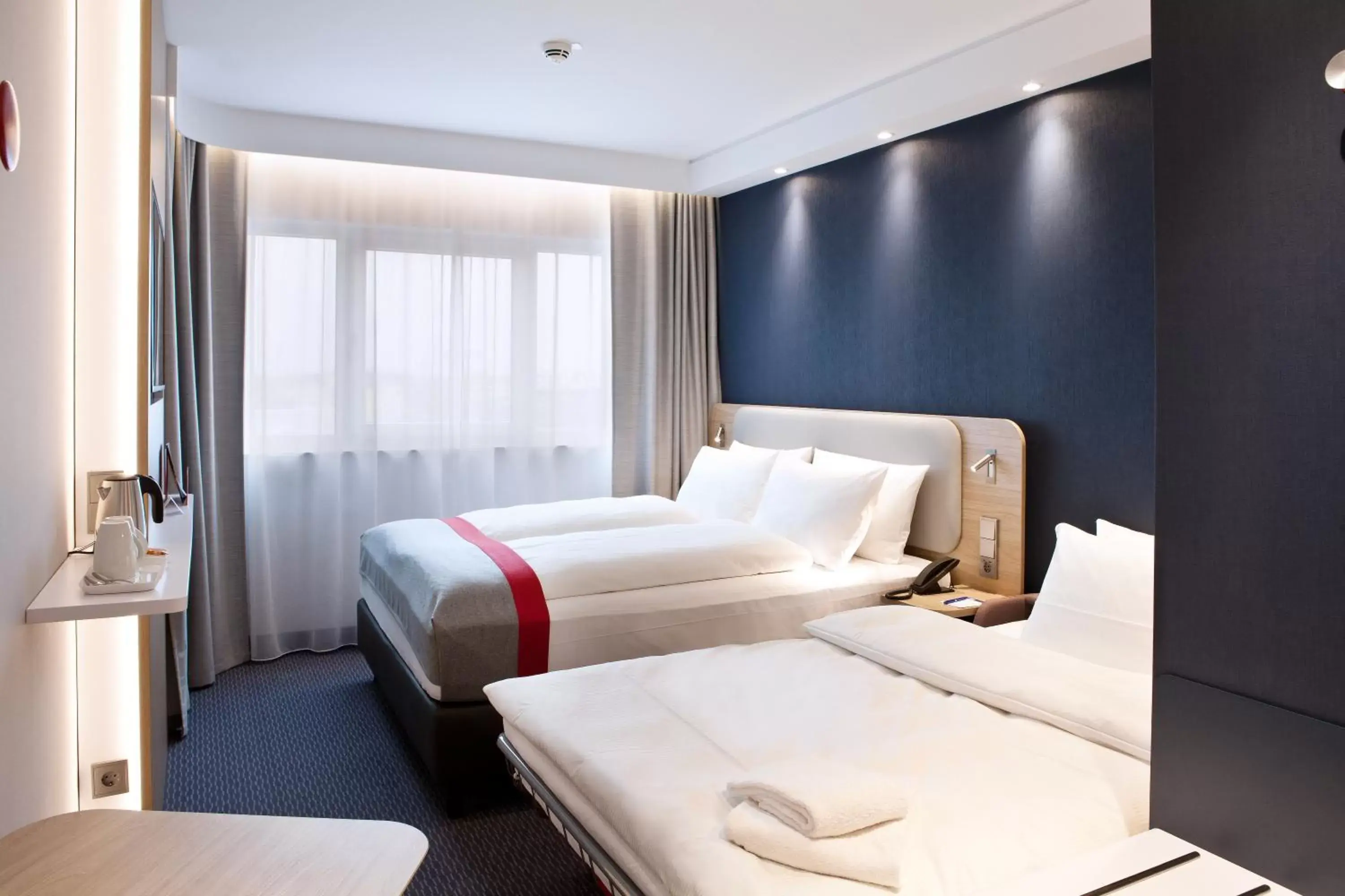 Bed in Holiday Inn Express - Offenburg, an IHG Hotel