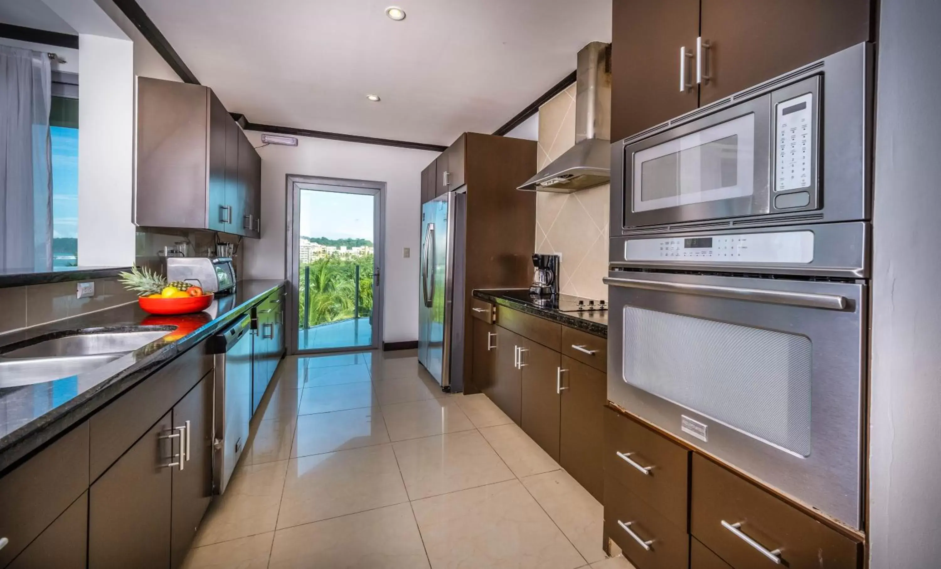 Kitchen/Kitchenette in Best in Jaco Condos at Diamante del Sol