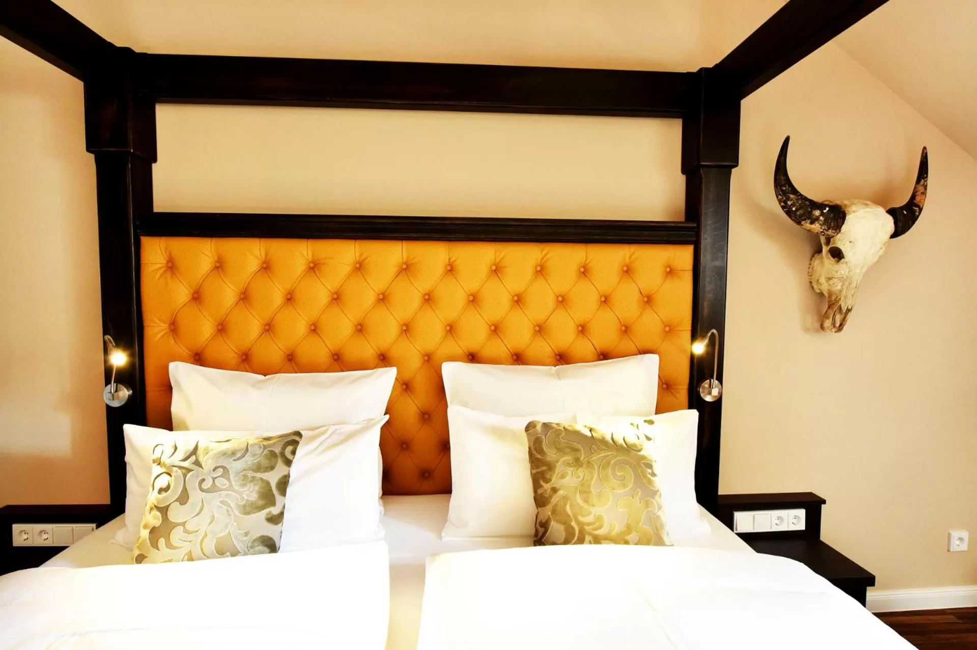 Decorative detail, Bed in MOMENTS Boutique Hotel