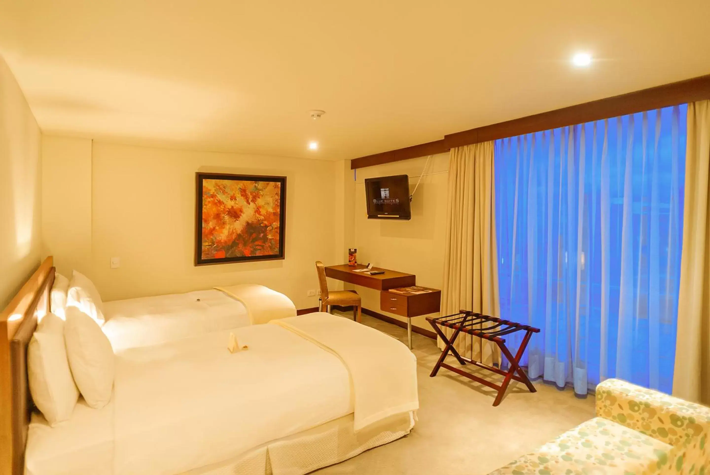 Photo of the whole room, Bed in Blue Suites Hotel