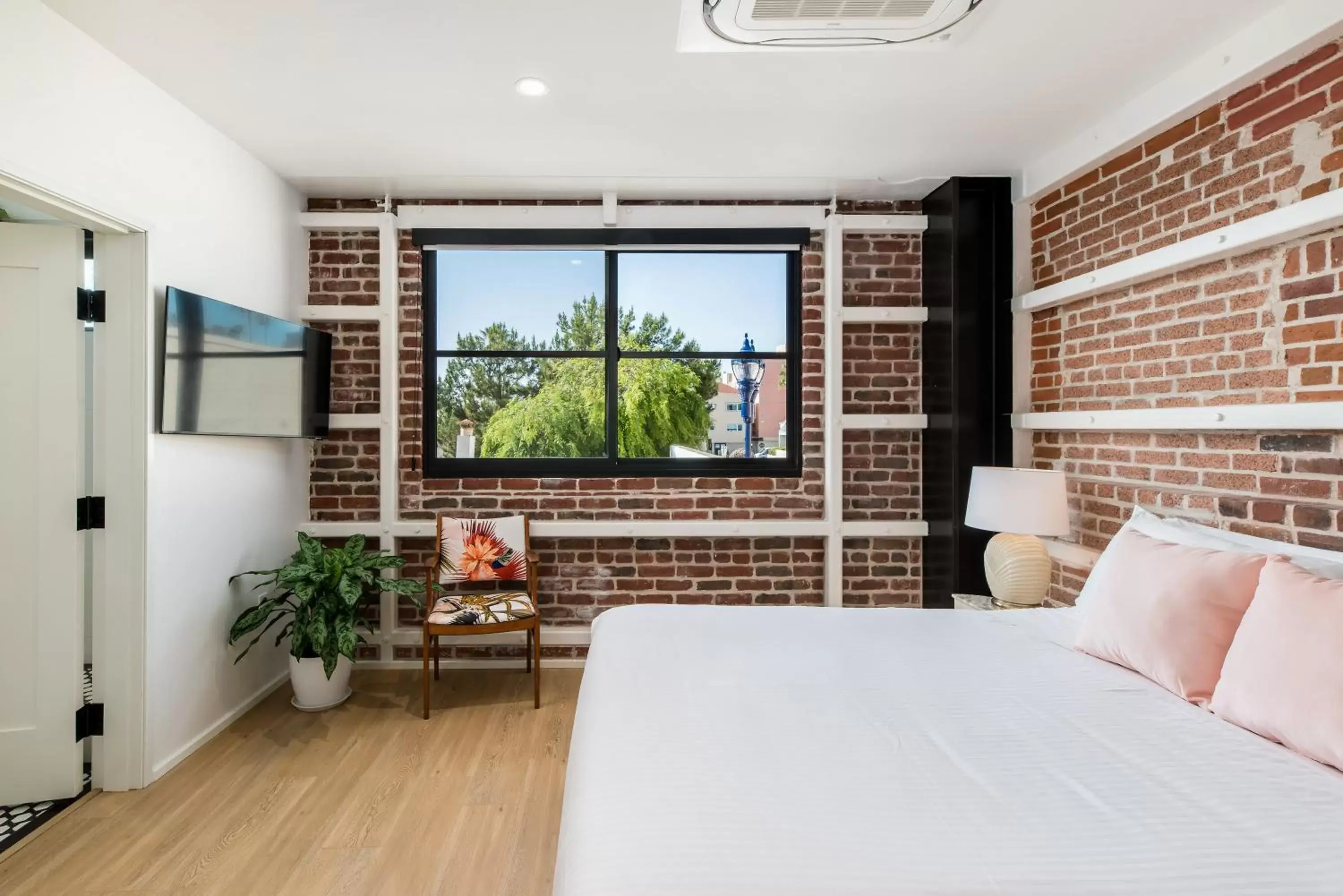 Bed in The Brick Boutique Hotel