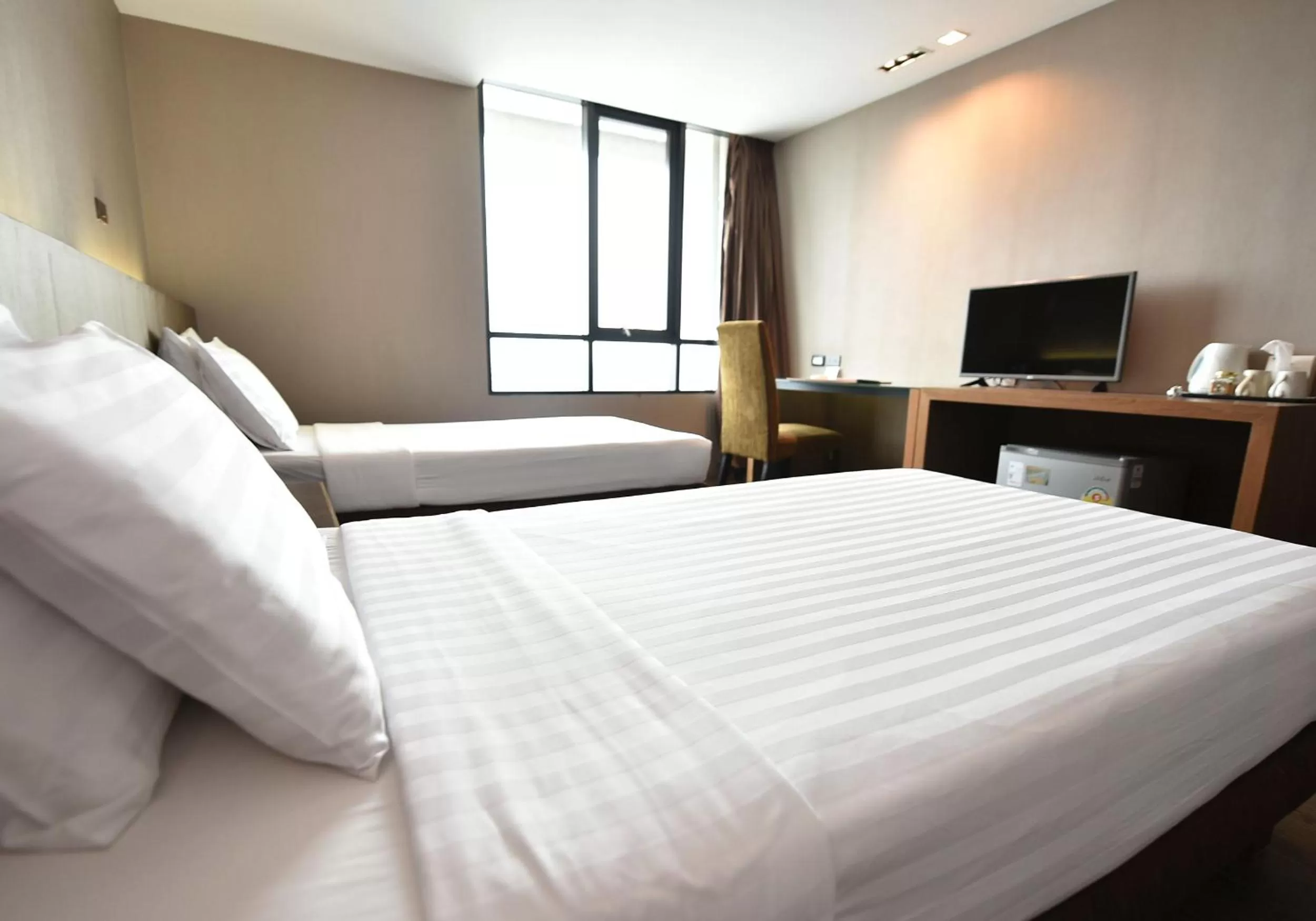 Bed in Bangkok City Hotel