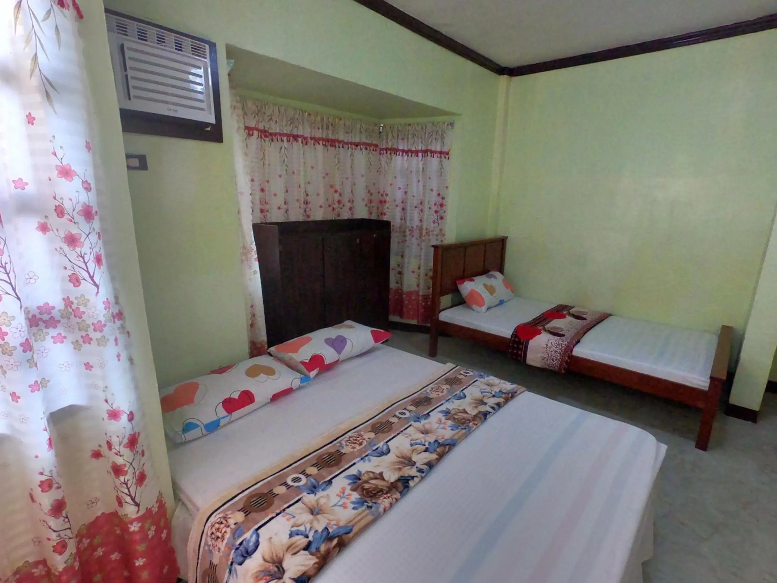 Bed in Bohol Sea Breeze Cottages and Resort