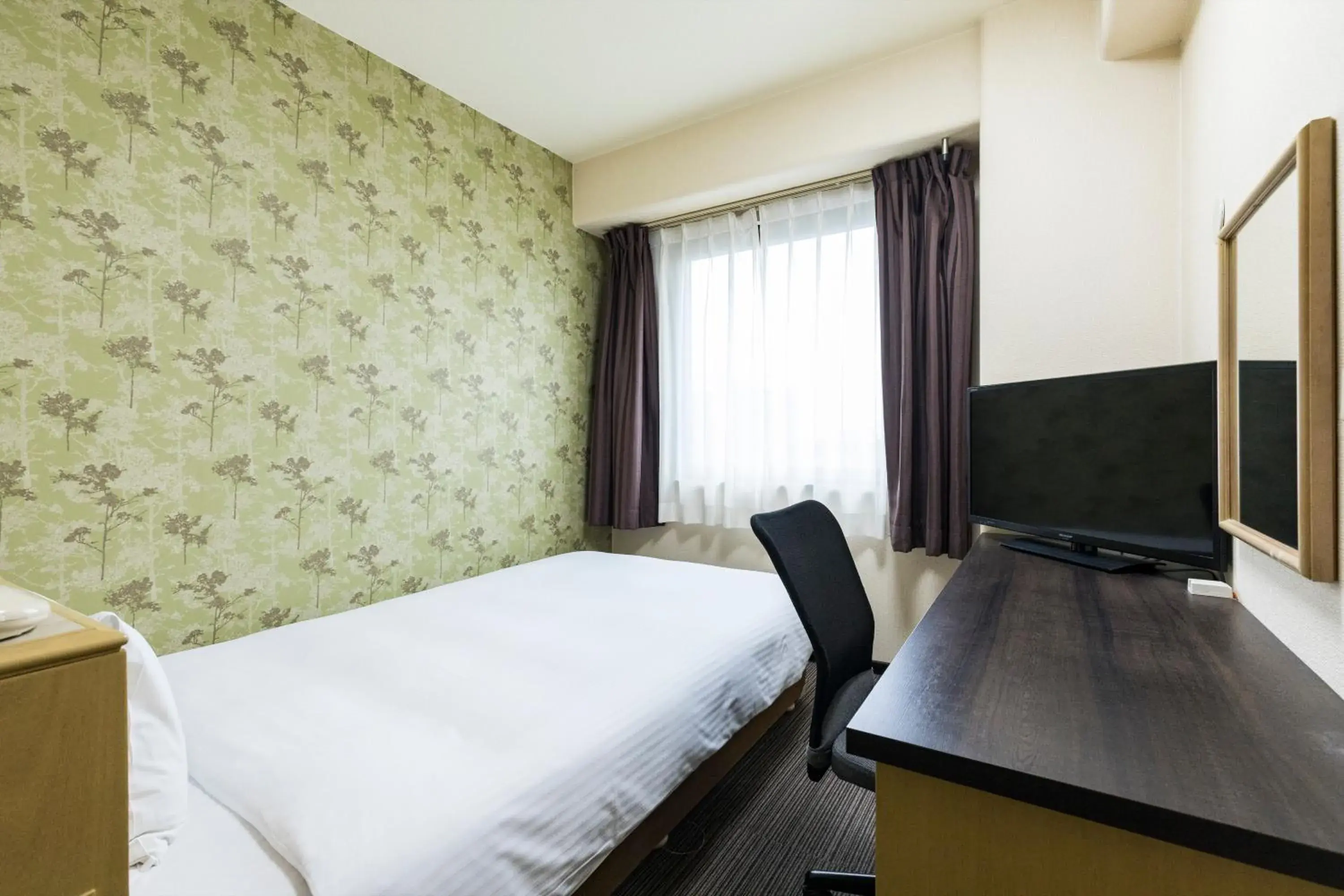 Bed in Hotel Wing International Kumamoto Yatsushiro