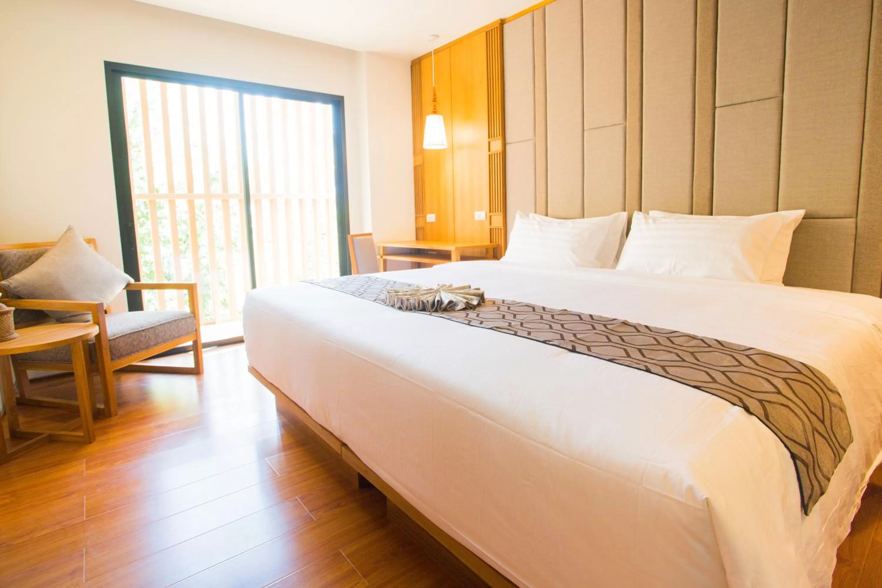 Bed in Lanna Thaphae Hotel