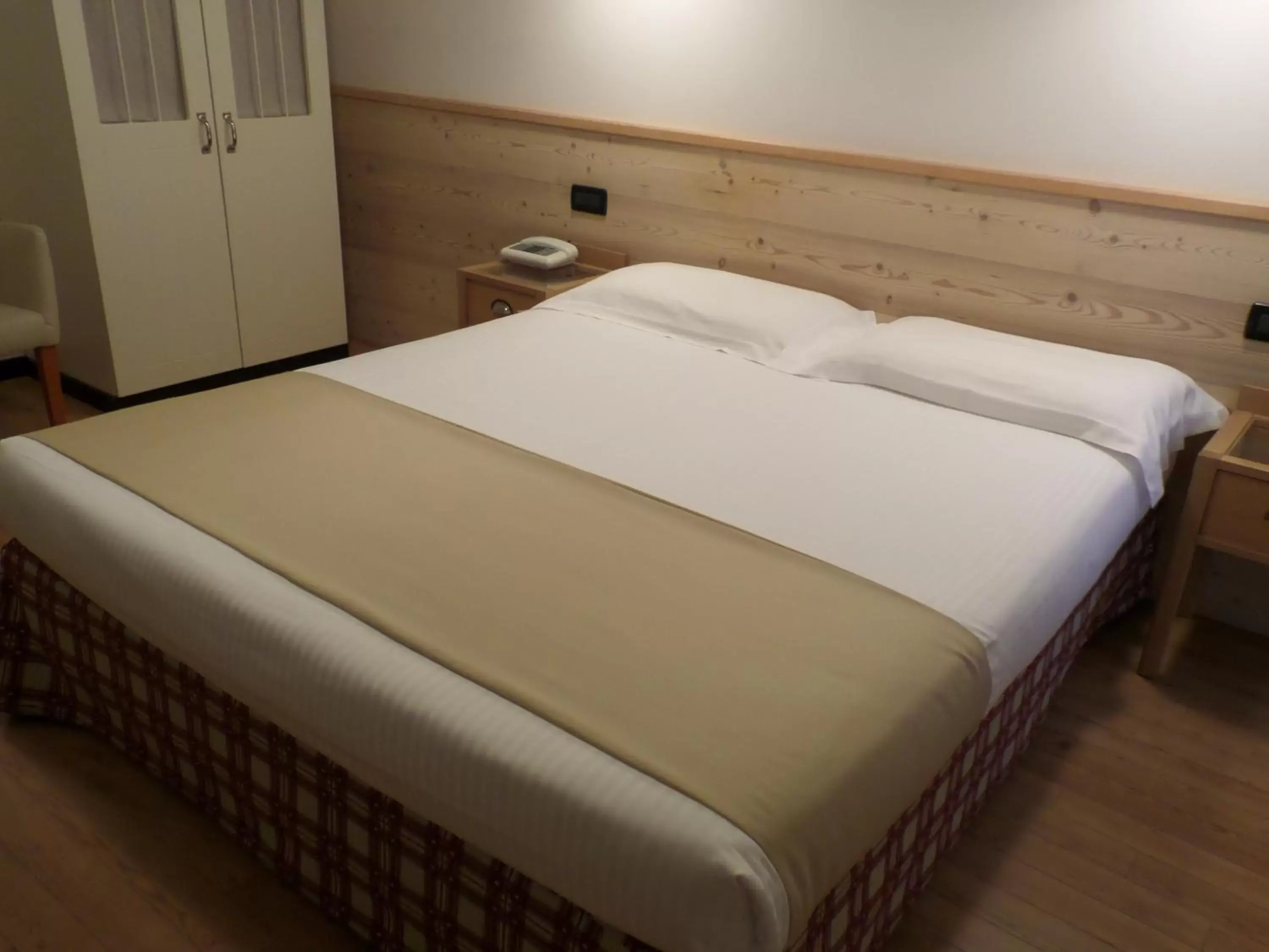 Bed in Hotel Miramonti