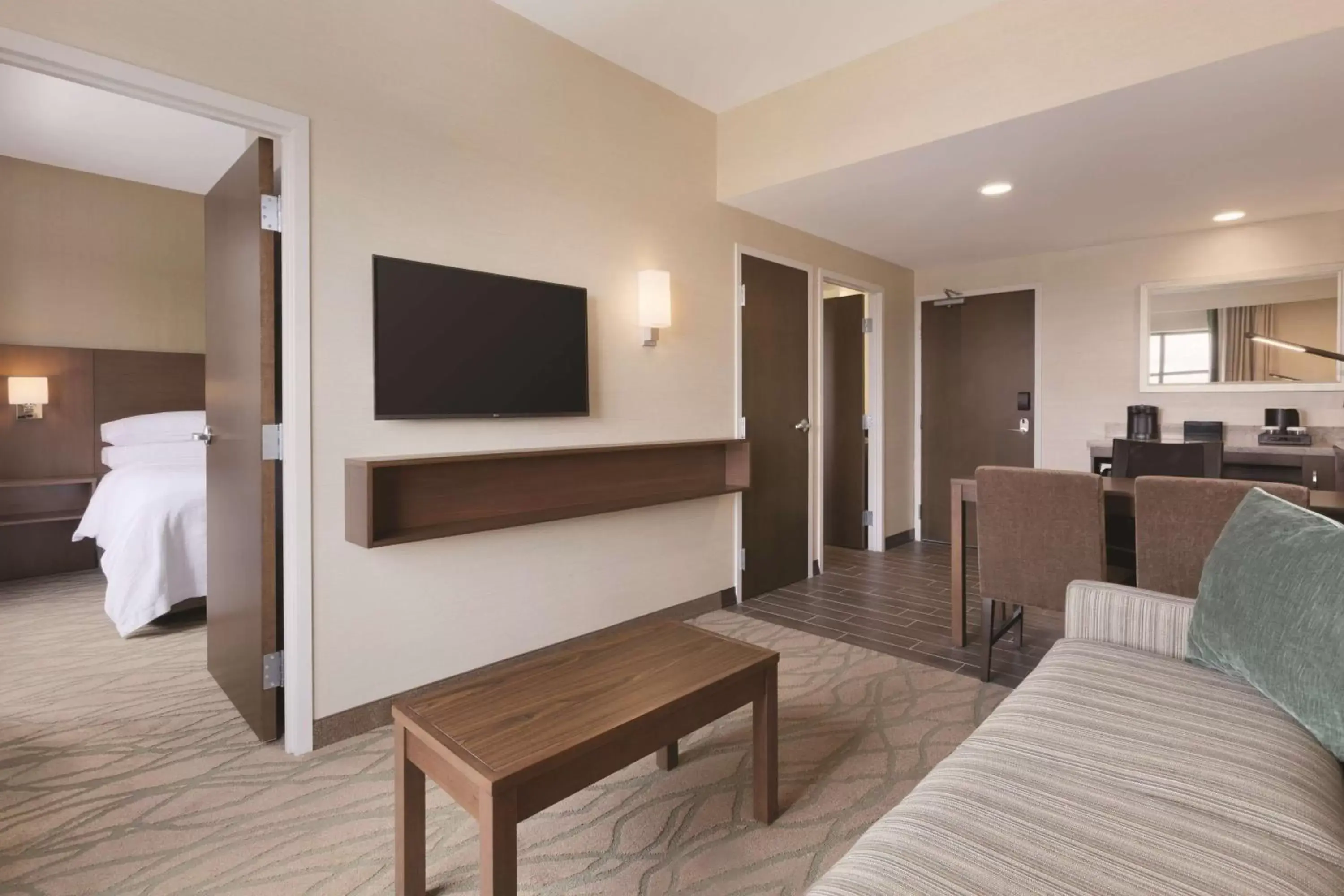 Bed, TV/Entertainment Center in Embassy Suites by Hilton Akron Canton Airport