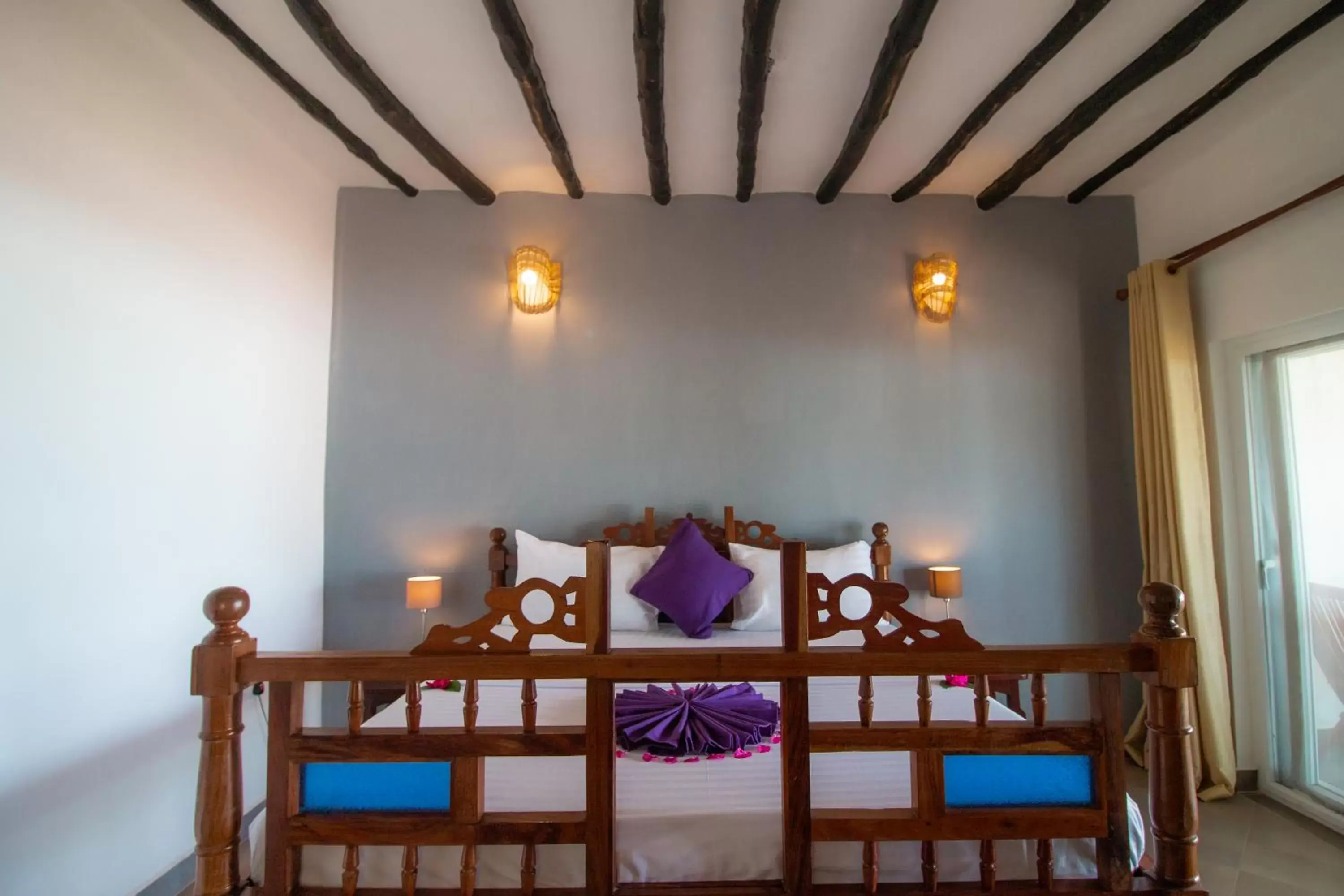 Bed in Tanzanite Beach Resort Bed in Tanzanite Beach Resort