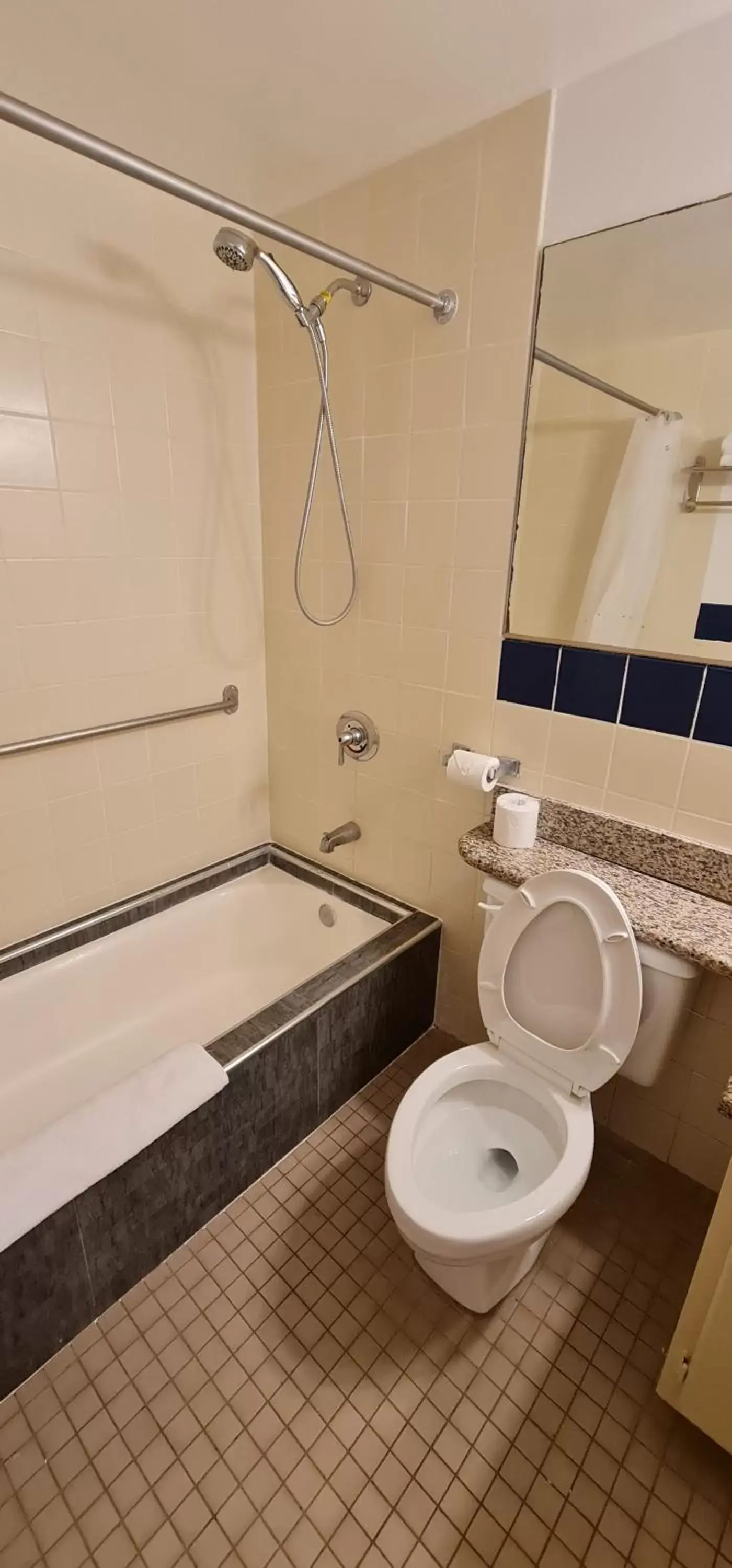 Bathroom in SureStay Hotel by Best Western Guam Palmridge