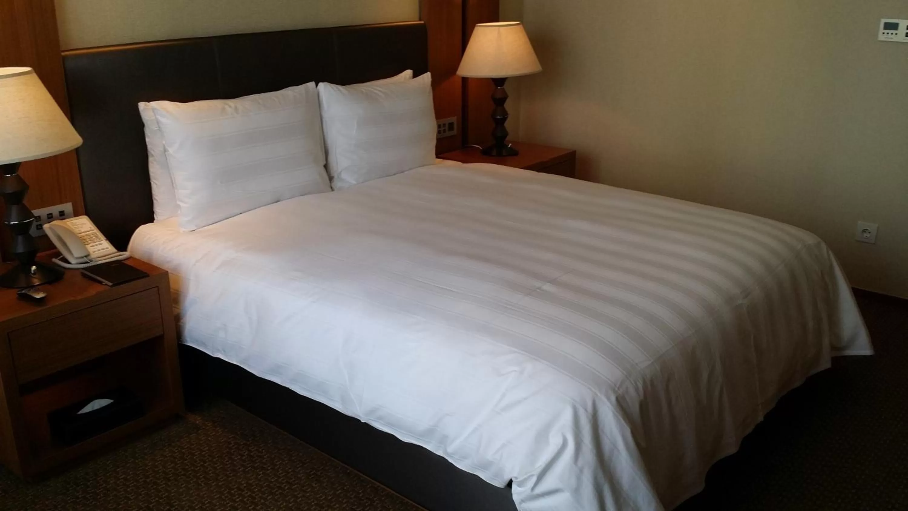 Bed in LOTTE CITY HOTEL Daejeon