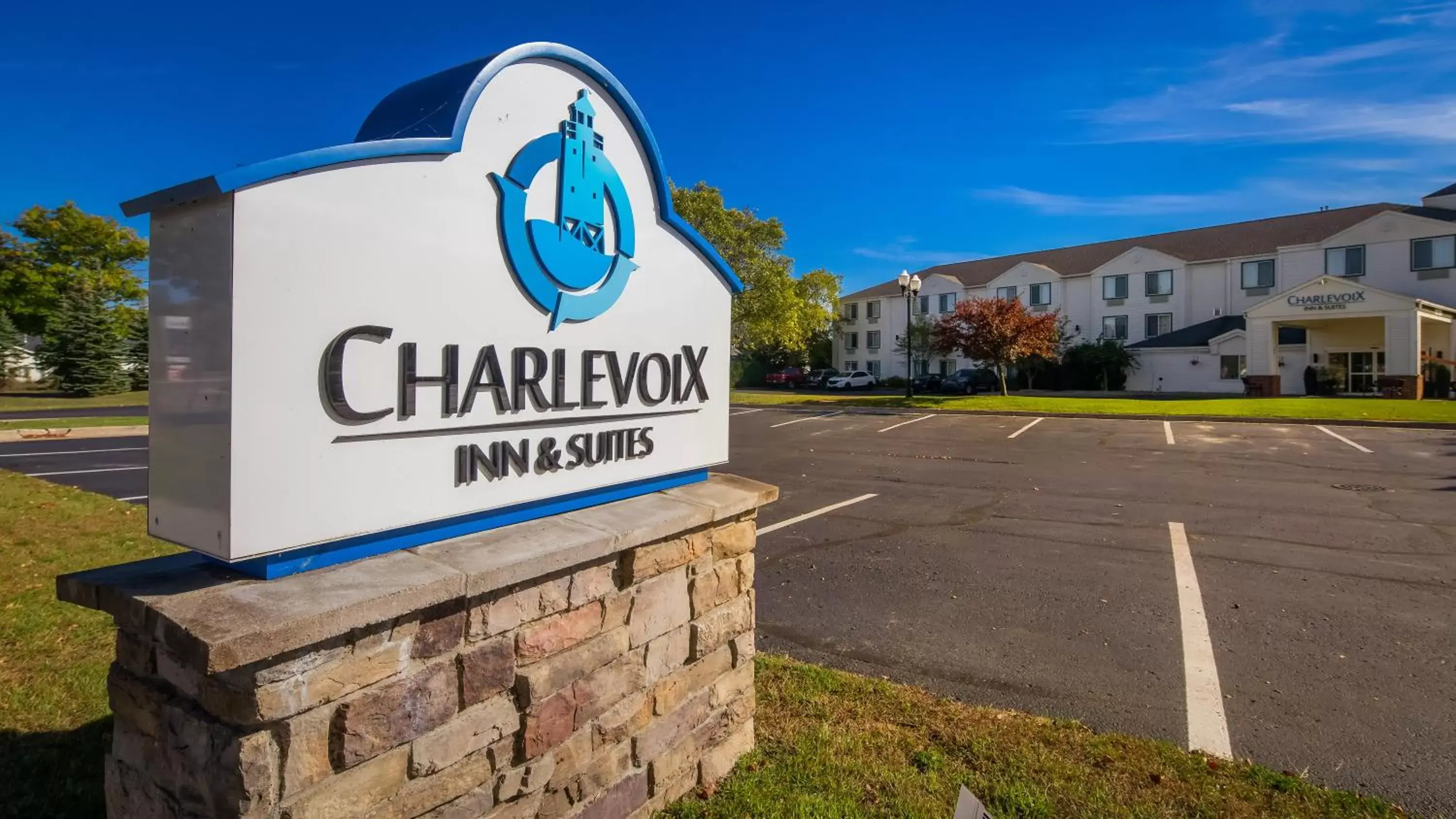 Property building, Property Logo/Sign in Charlevoix Inn & Suites SureStay Collection by Best Western