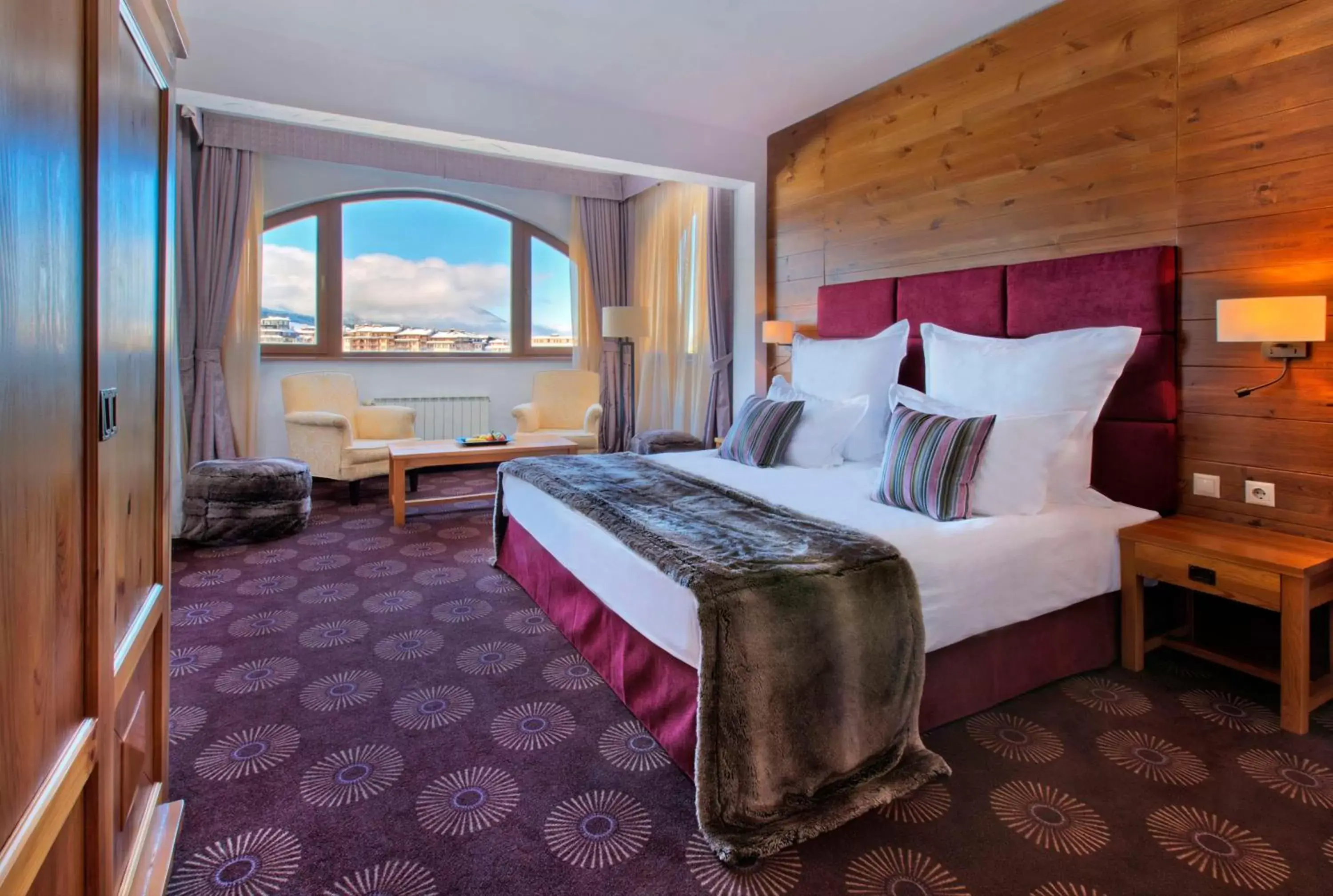 Photo of the whole room, Bed in Kempinski Hotel Grand Arena Bansko