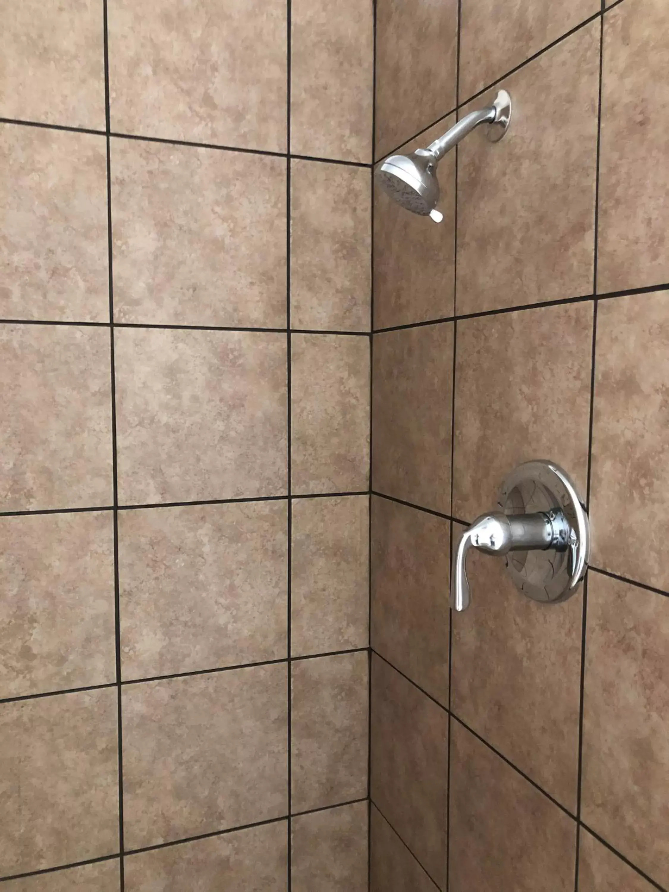 Bathroom in Maple Inn and Suites Los Banos