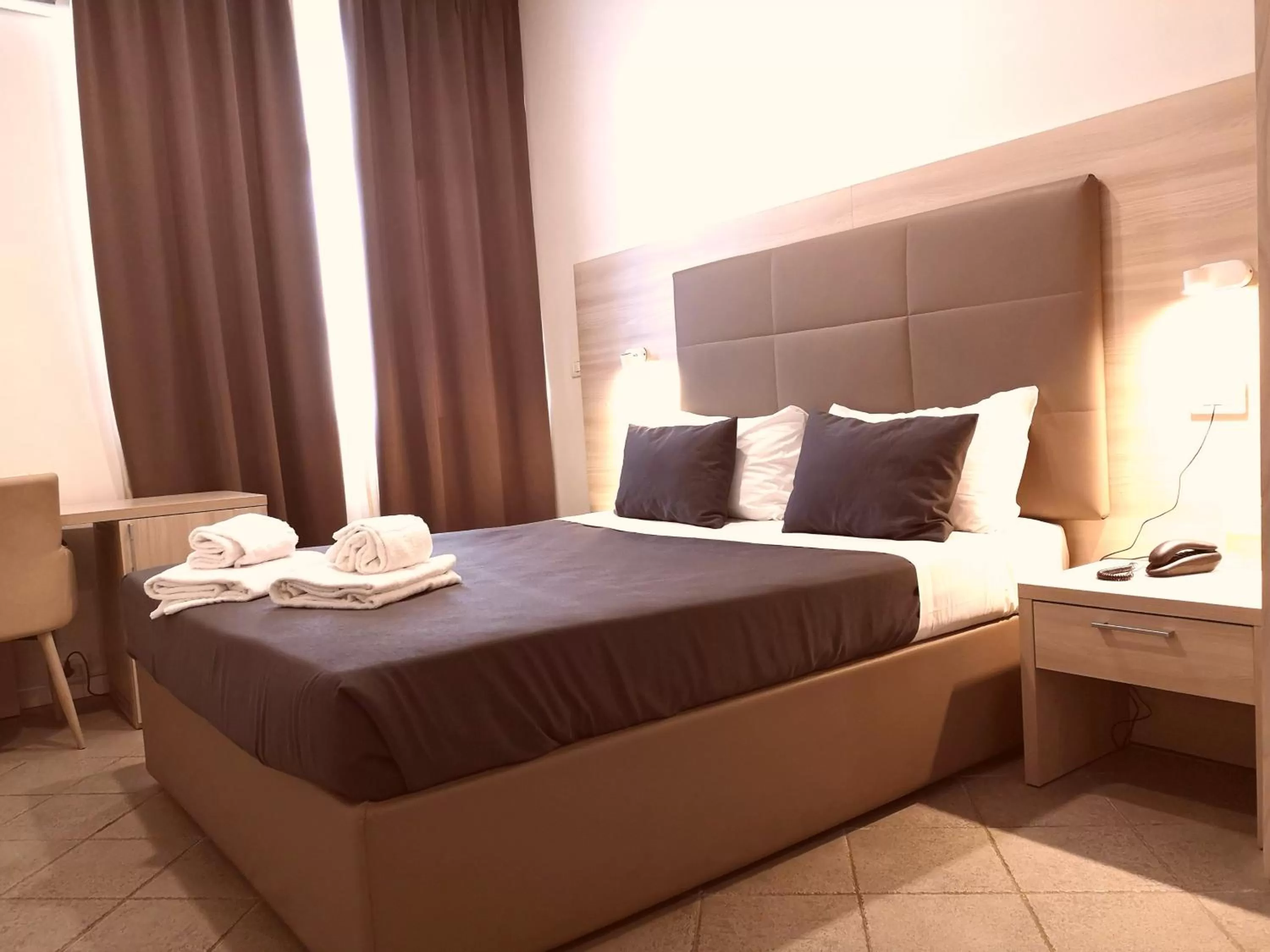 Bed in Academy Hotel