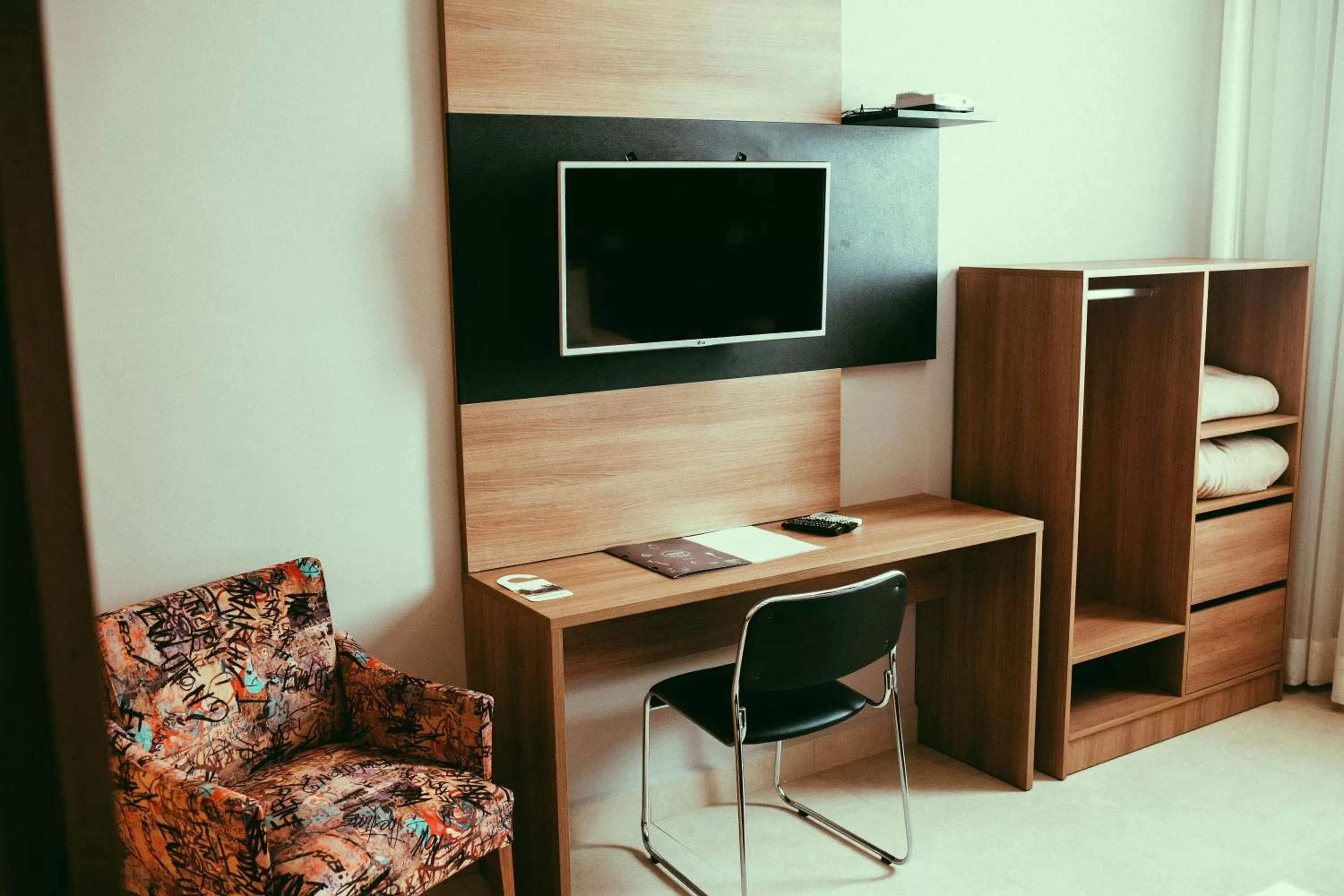 Communal lounge/ TV room in Occitano Apart Hotel