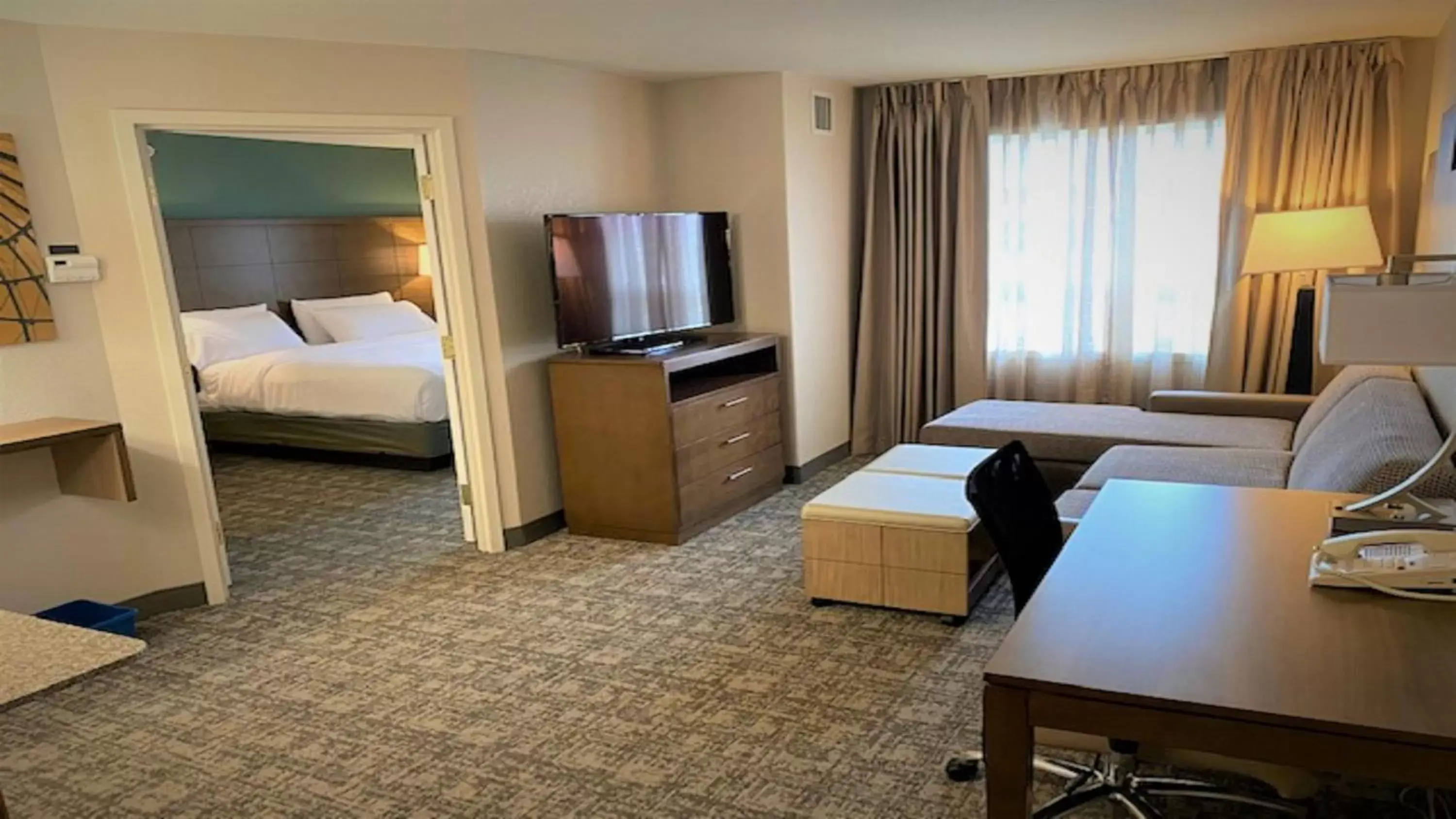 Photo of the whole room, TV/Entertainment Center in Staybridge Suites - Calgary Airport, an IHG Hotel