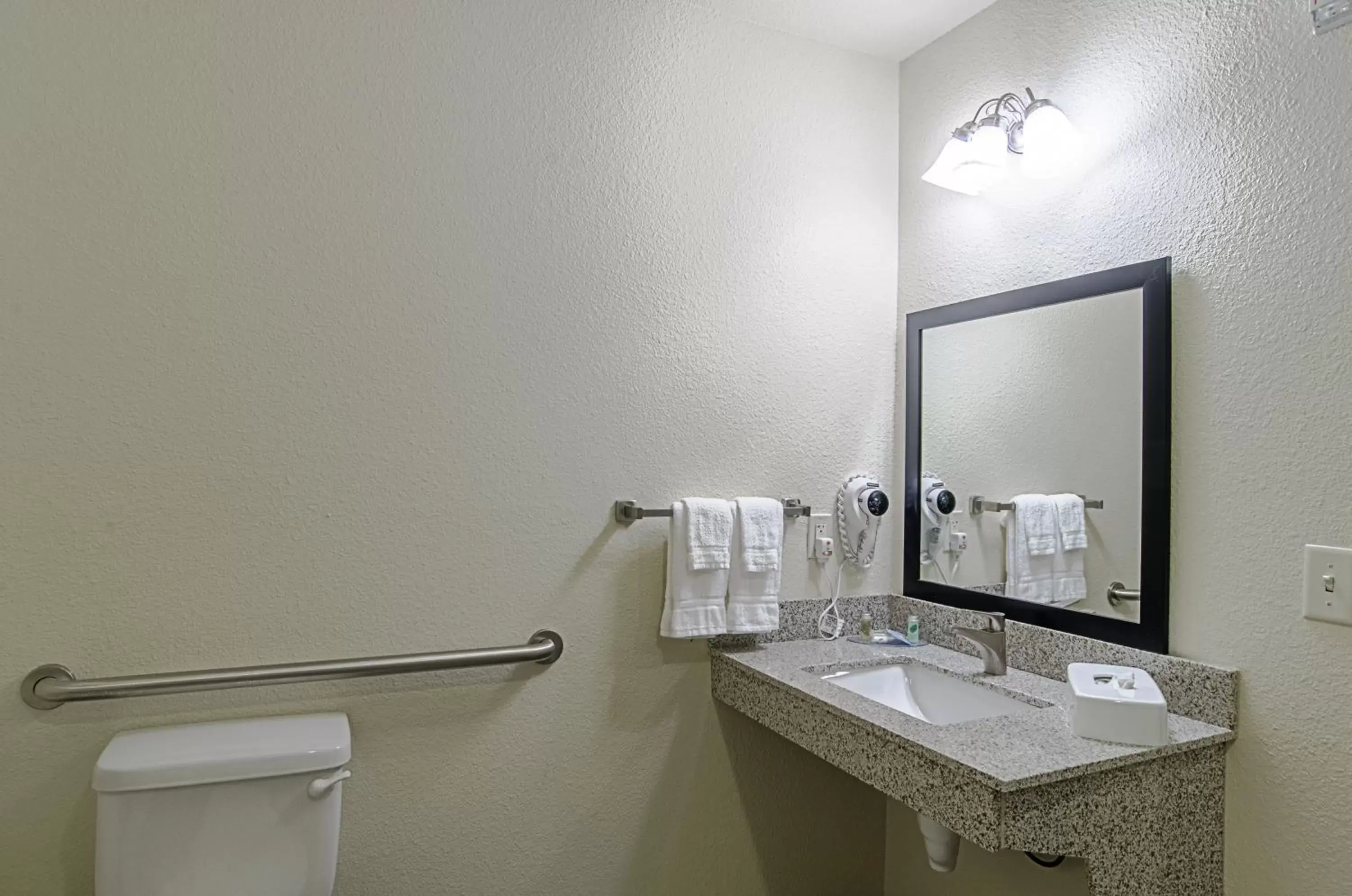 Toilet, Bathroom in Cobblestone Inn & Suites - Guernsey