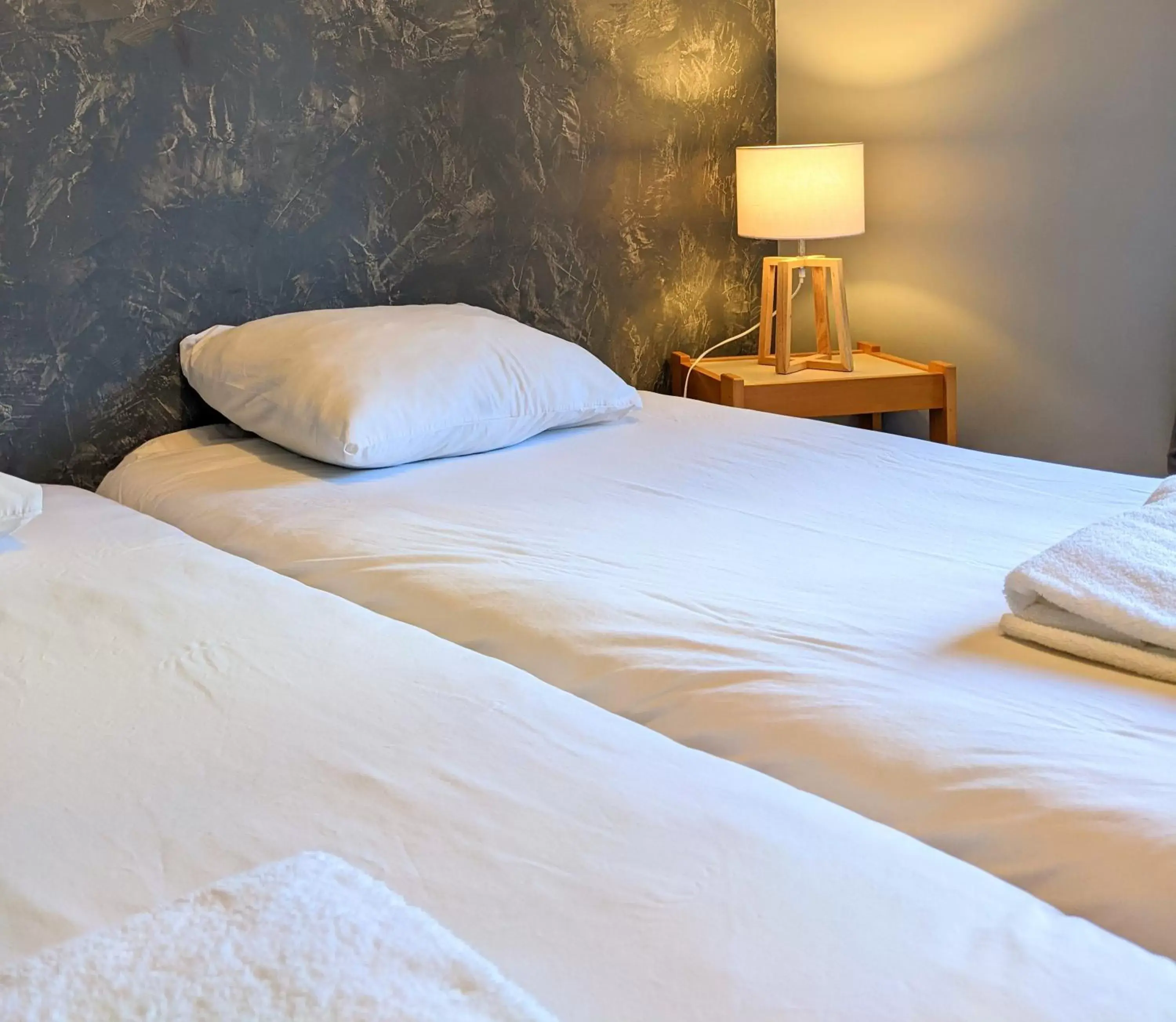 Bed in Auberge des Remparts