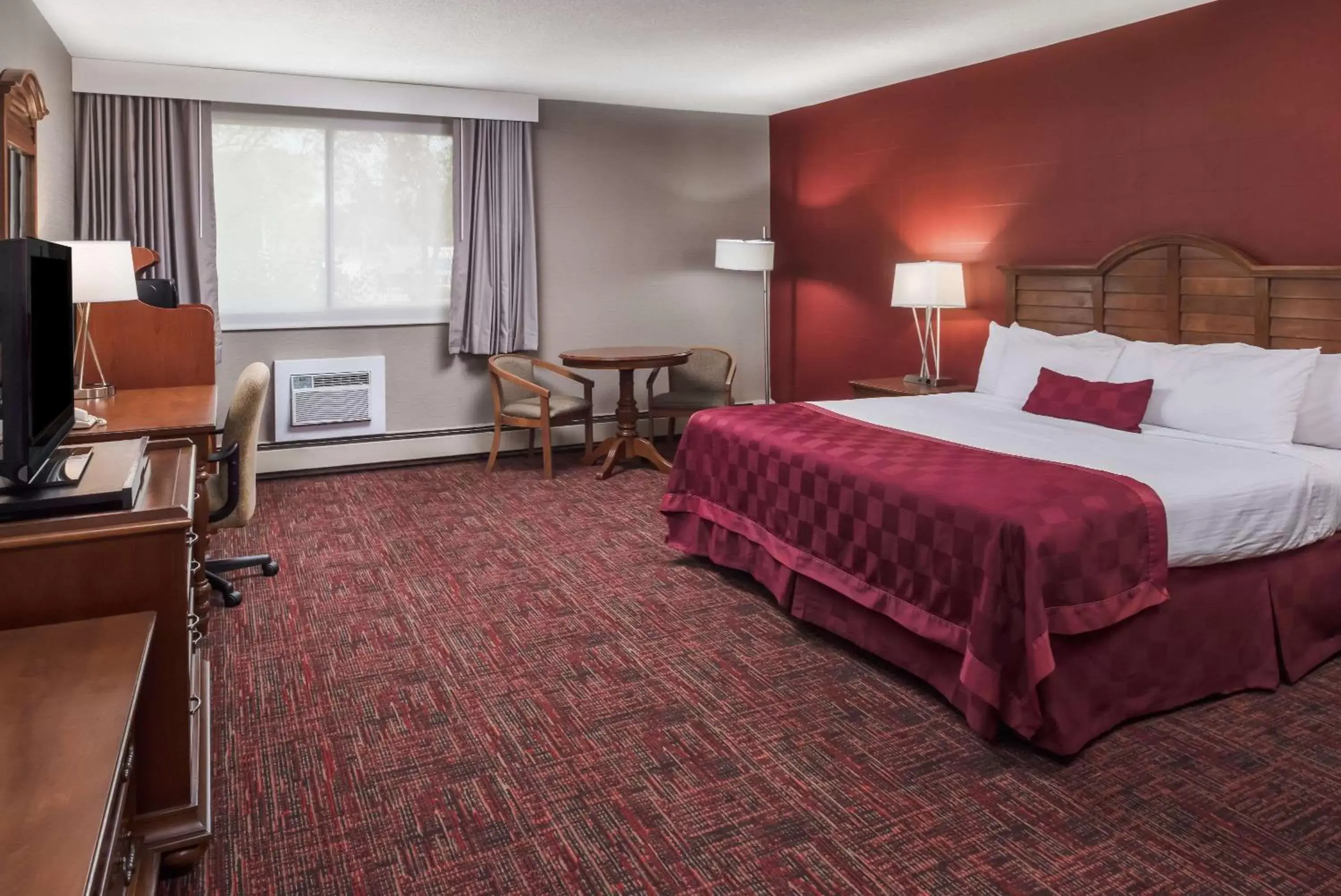 Photo of the whole room, Bed in Ramada by Wyndham Grand Forks