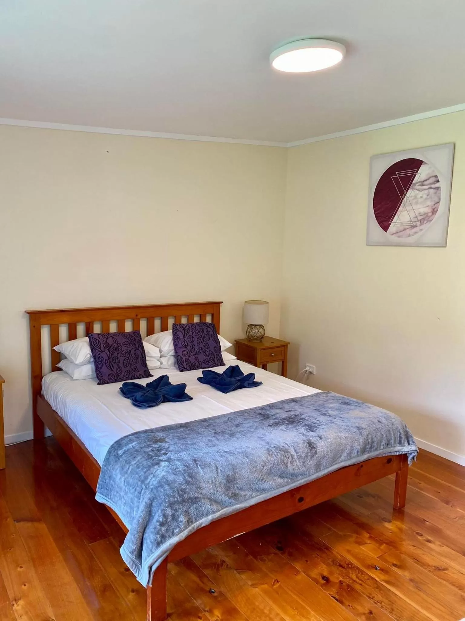 Bed in Kawai Purapura Yoga Retreat Centre