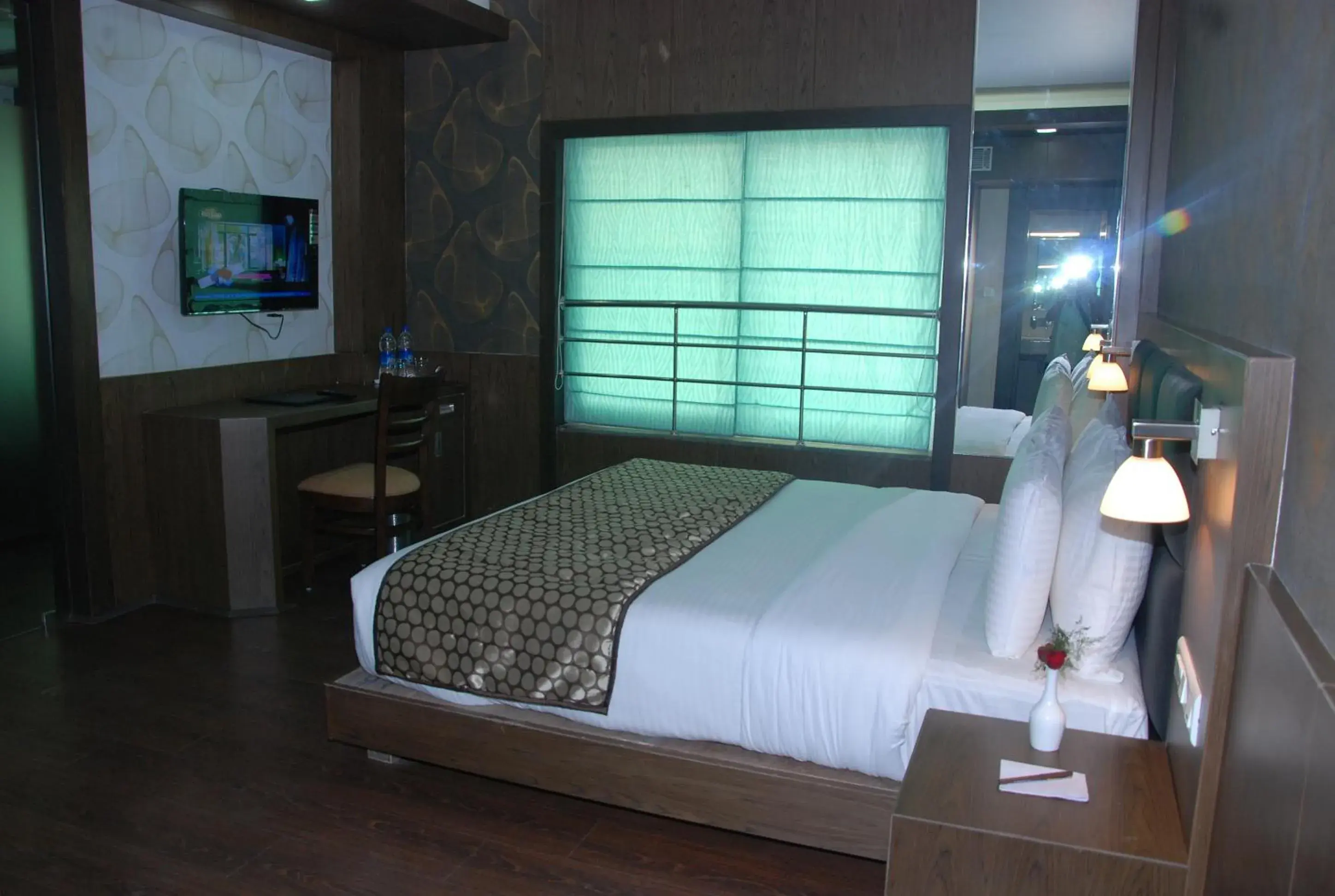 Bed in Pride Ananya Resort Puri