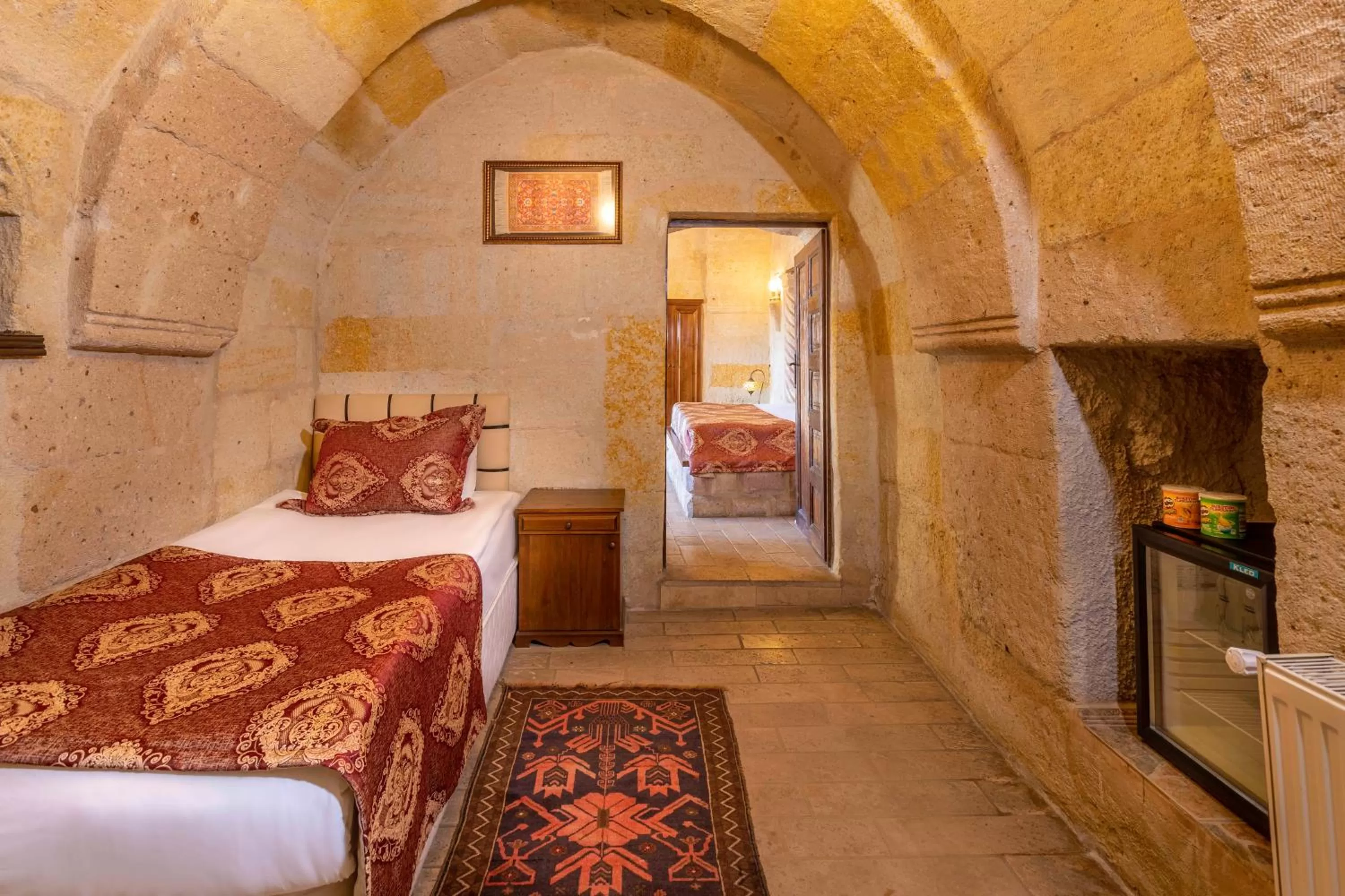 Bed in Adora Cave Suites -