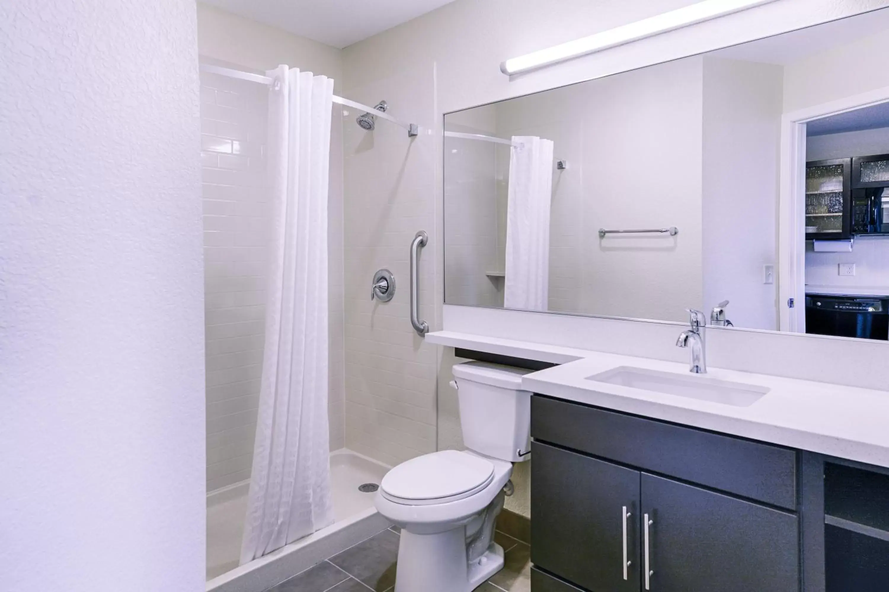 Bathroom in Candlewood Suites Lakeville I-35, an IHG Hotel