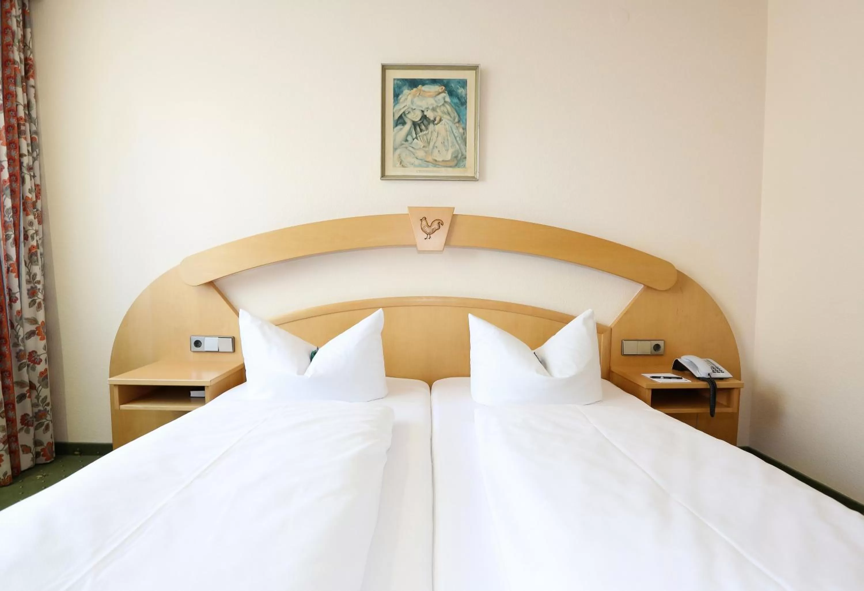 Bed in Arthotel ANA Goggl