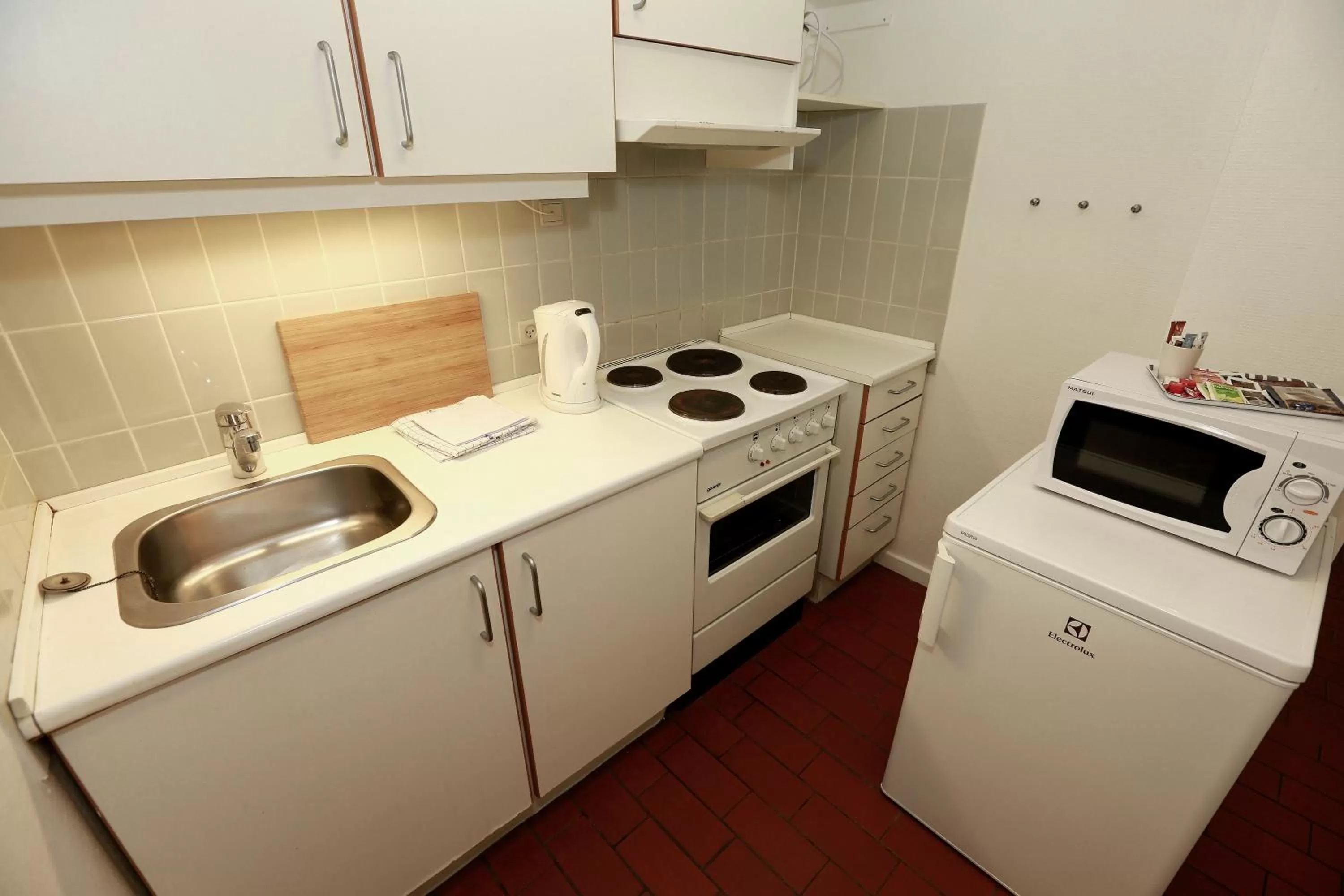 Kitchen or kitchenette in Hotel 9 små hjem