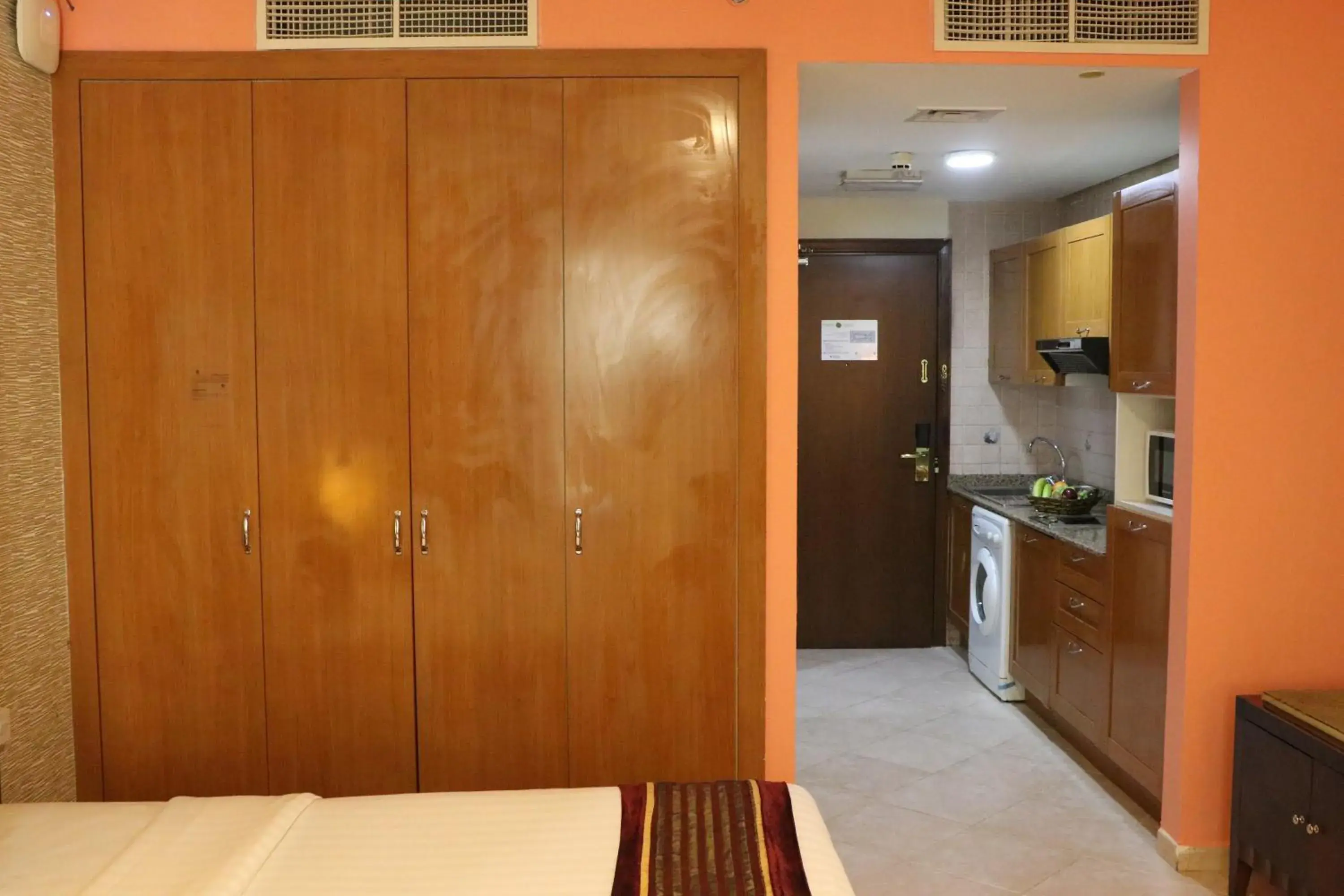 Bedroom, Kitchen/Kitchenette in Al Manar Grand Hotel Apartment