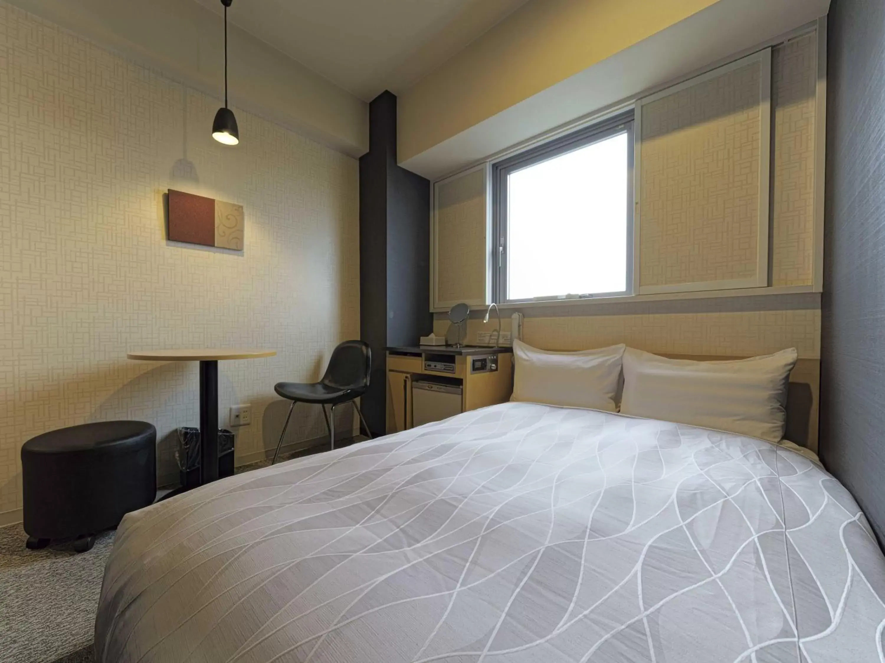 Bed in Meitetsu Inn Chita Handa Ekimae Bed in Meitetsu Inn Chita Handa Ekimae