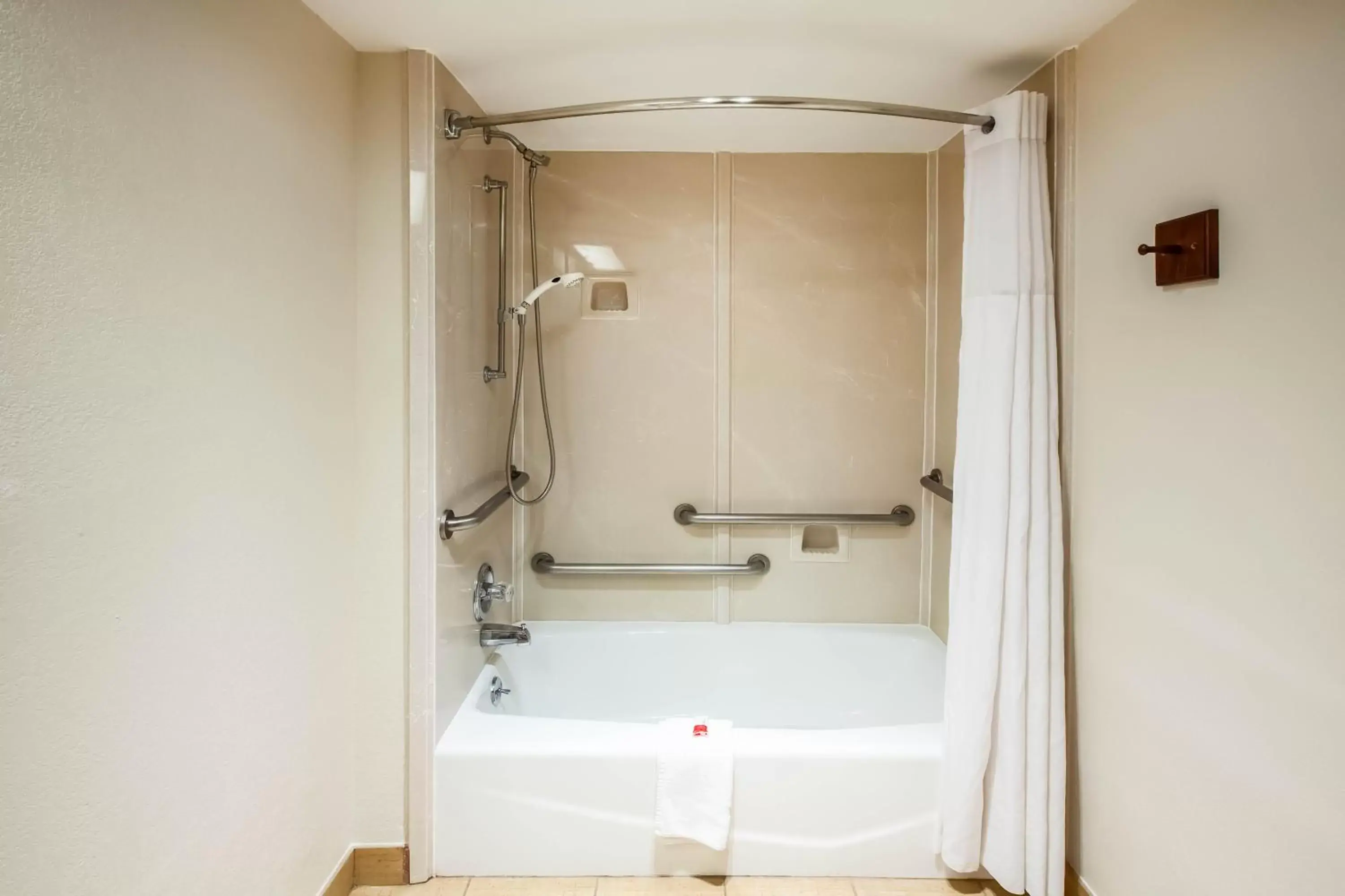 Bathroom in Days Inn & Suites by Wyndham Tyler