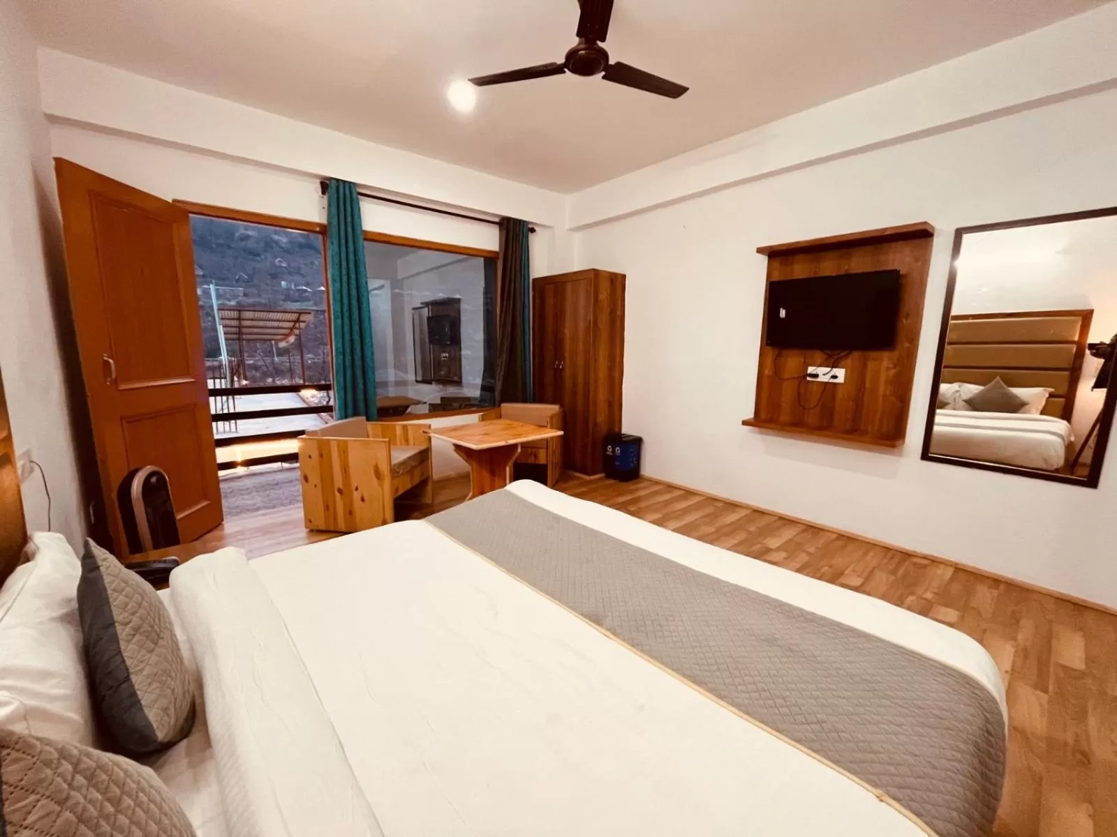 Bed in Himalayan Riverside Resort, Manali