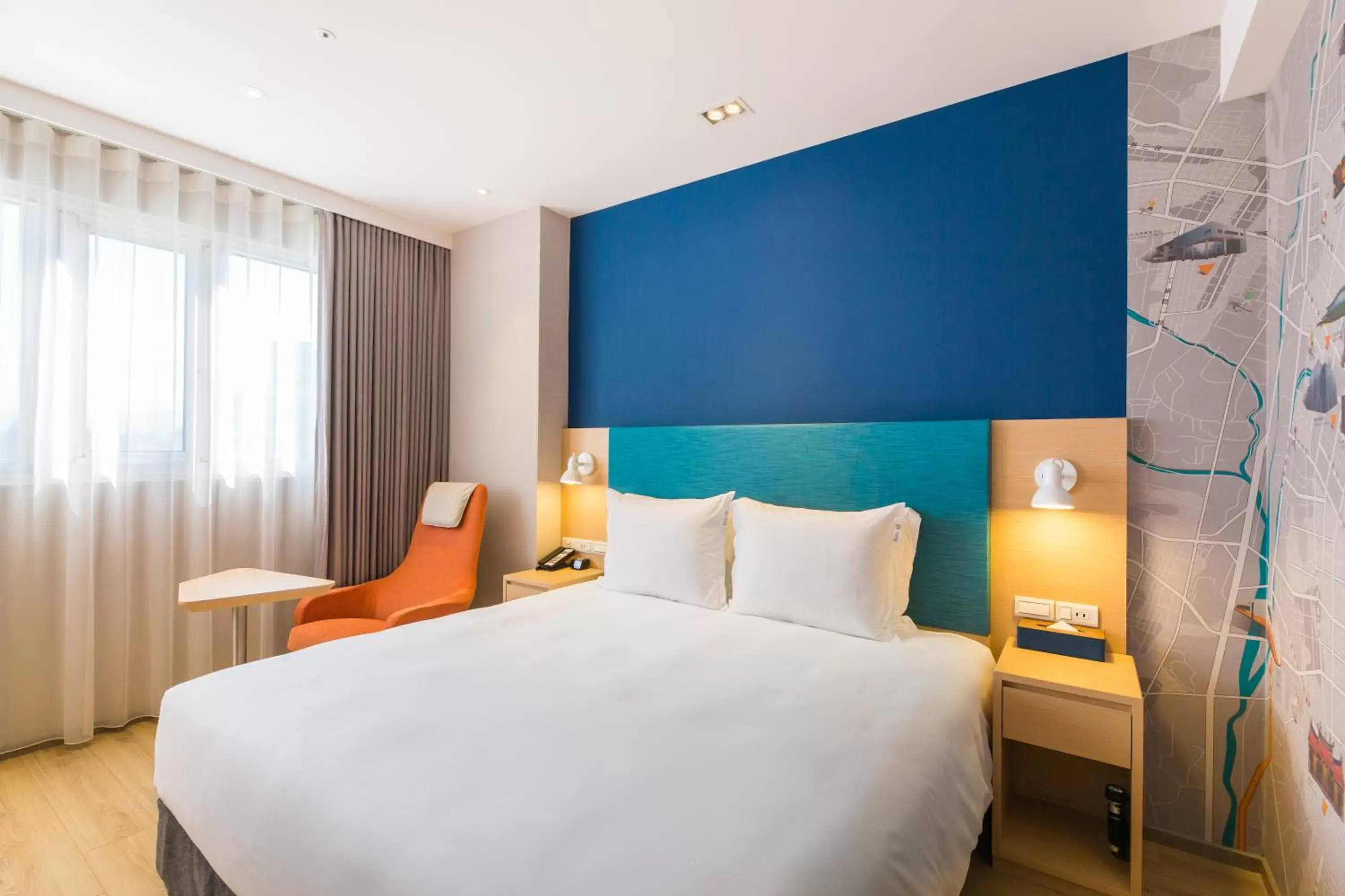 Bed in Holiday Inn Express Taichung Fengchia, an IHG Hotel