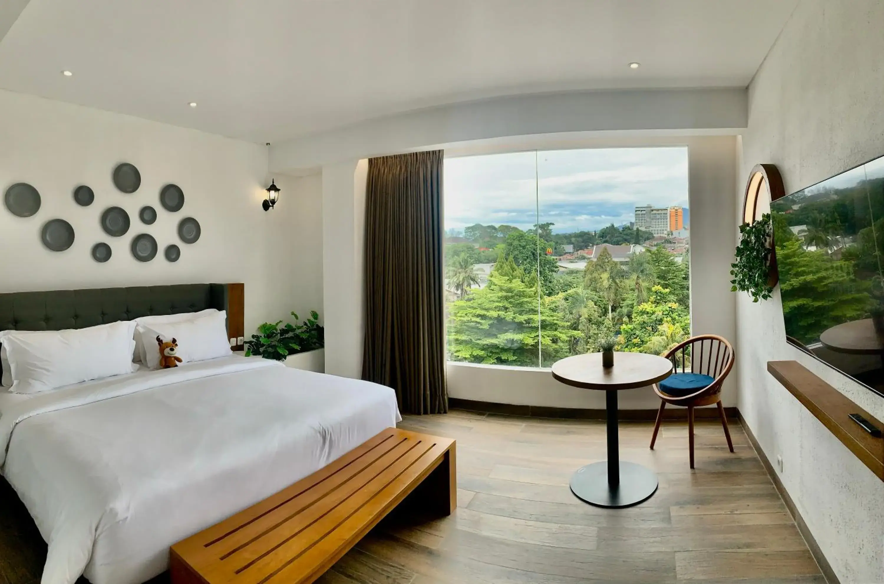 Bed in Hemangini Hotel Bandung