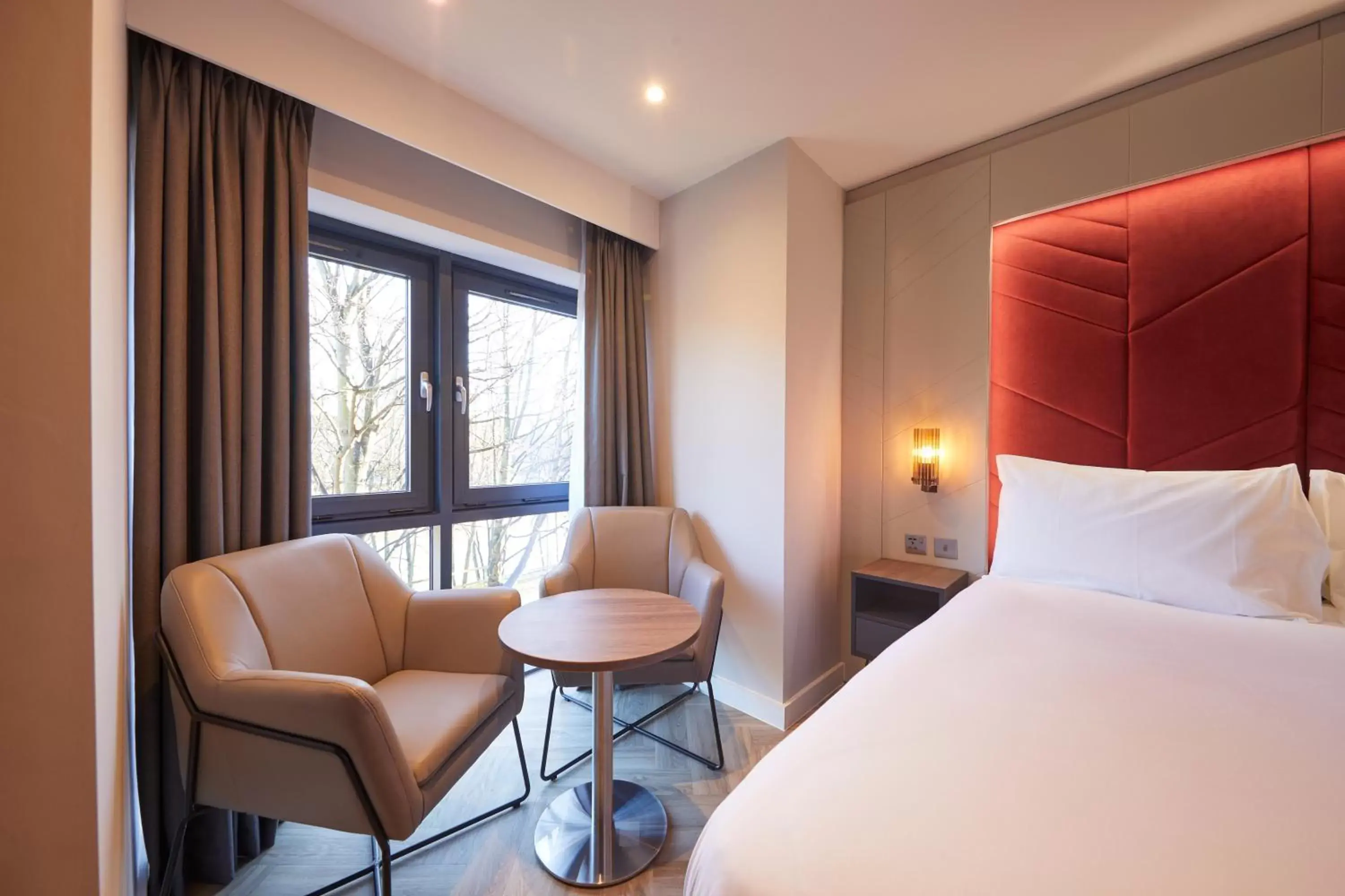 Seating area, Bed in Roomzzz York City Seating area, Bed in Roomzzz York City