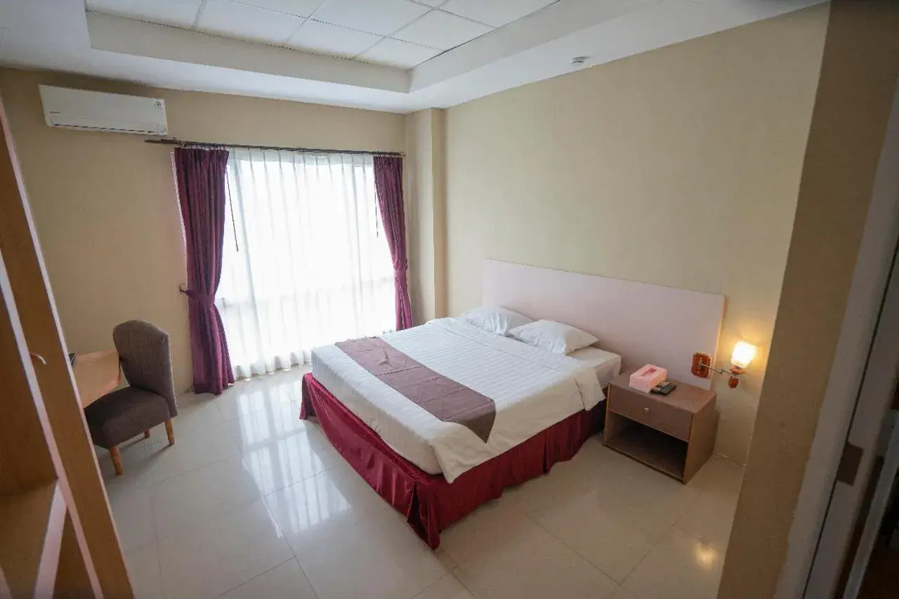 Bed in Bangka City Hotel