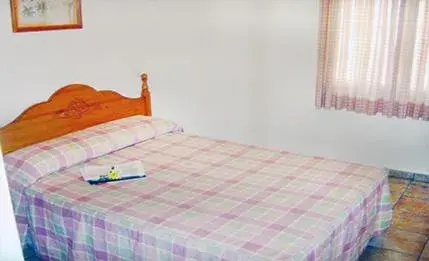Bed in Hotel Miraflores