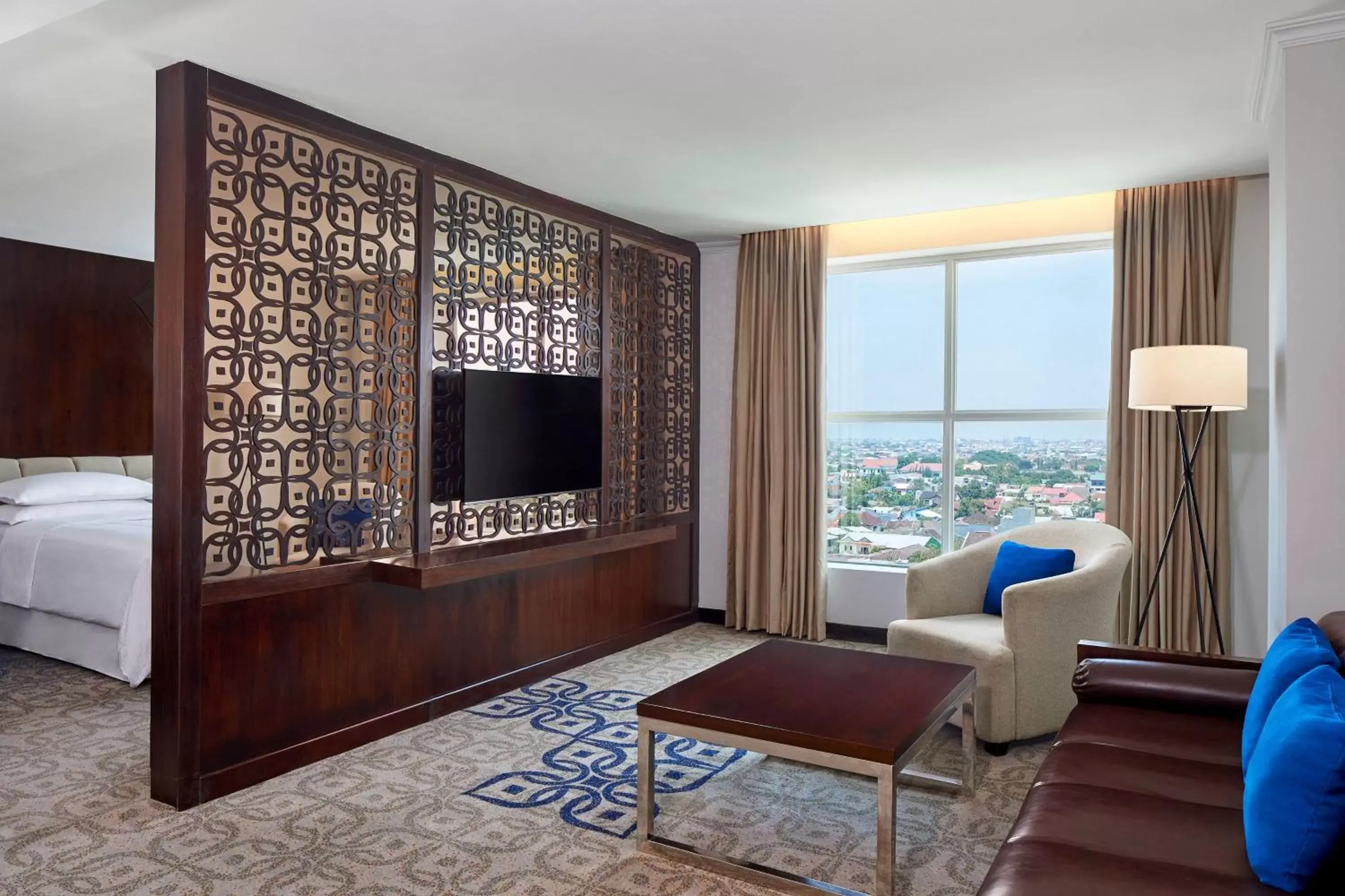 Living room, TV/Entertainment Center in Four Points by Sheraton Makassar