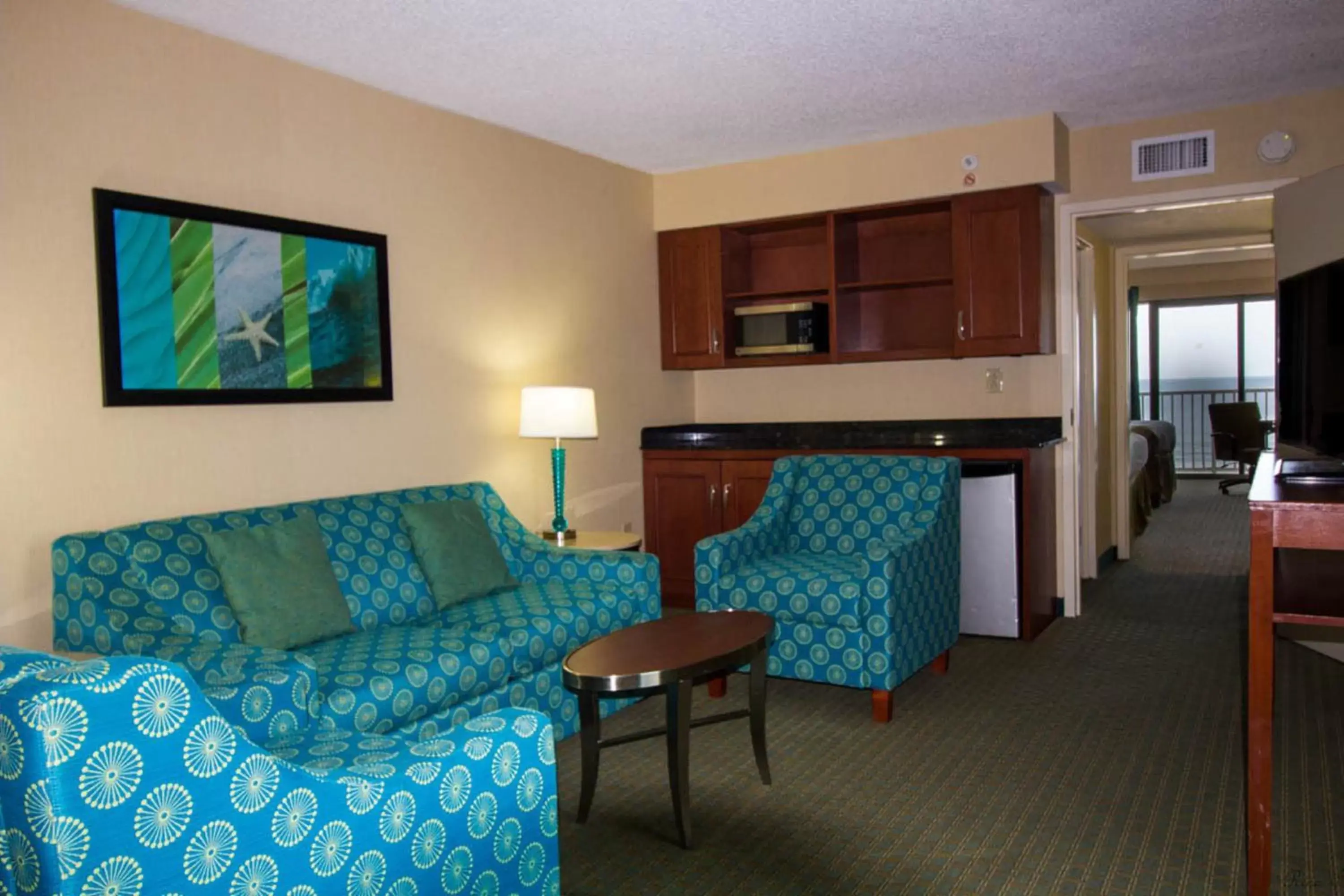 Photo of the whole room, Seating Area in Holiday Inn & Suites Virginia Beach - North Beach, an IHG Hotel