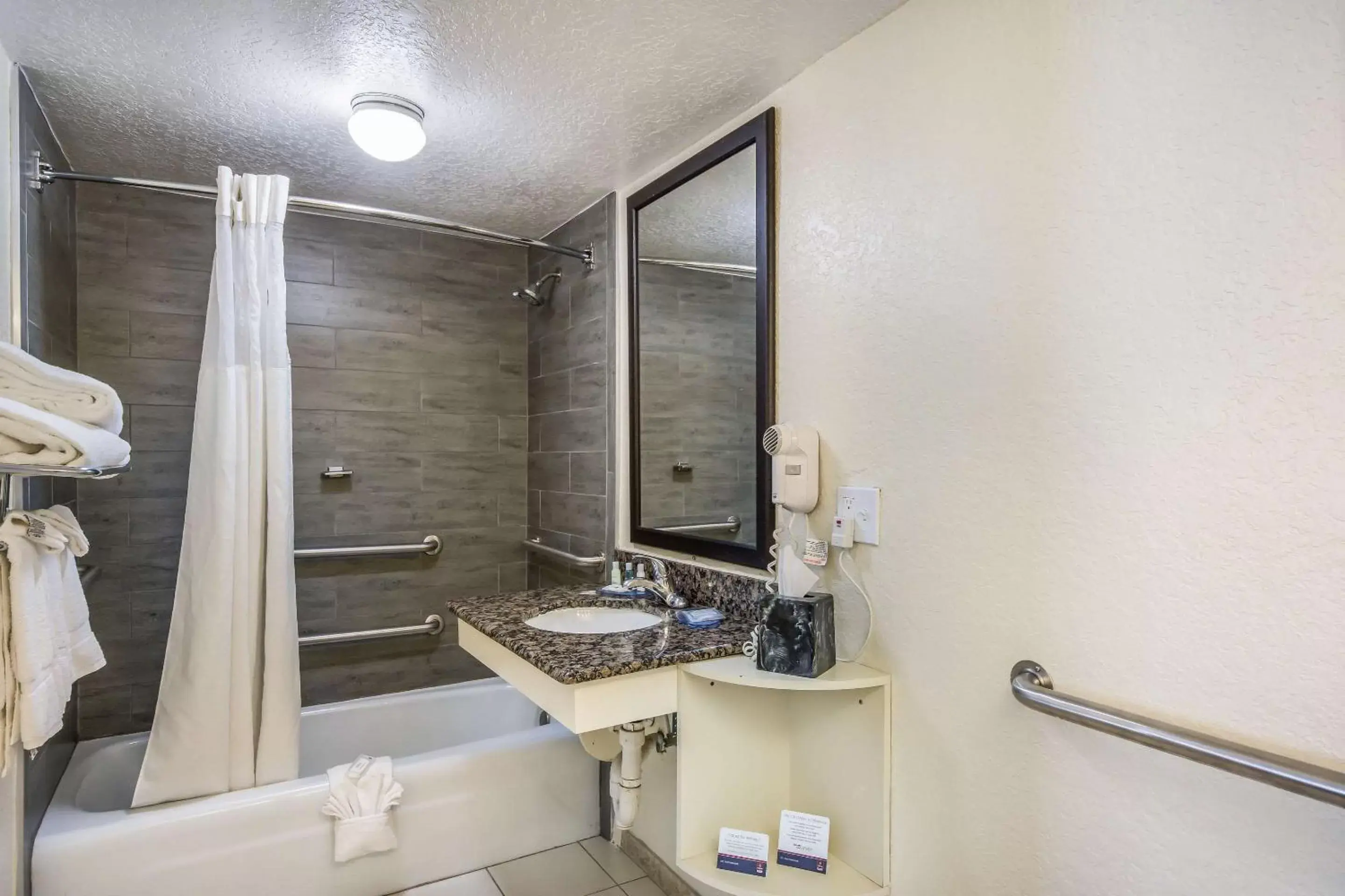 Bathroom in Clarion Inn & Suites Central Clearwater Beach