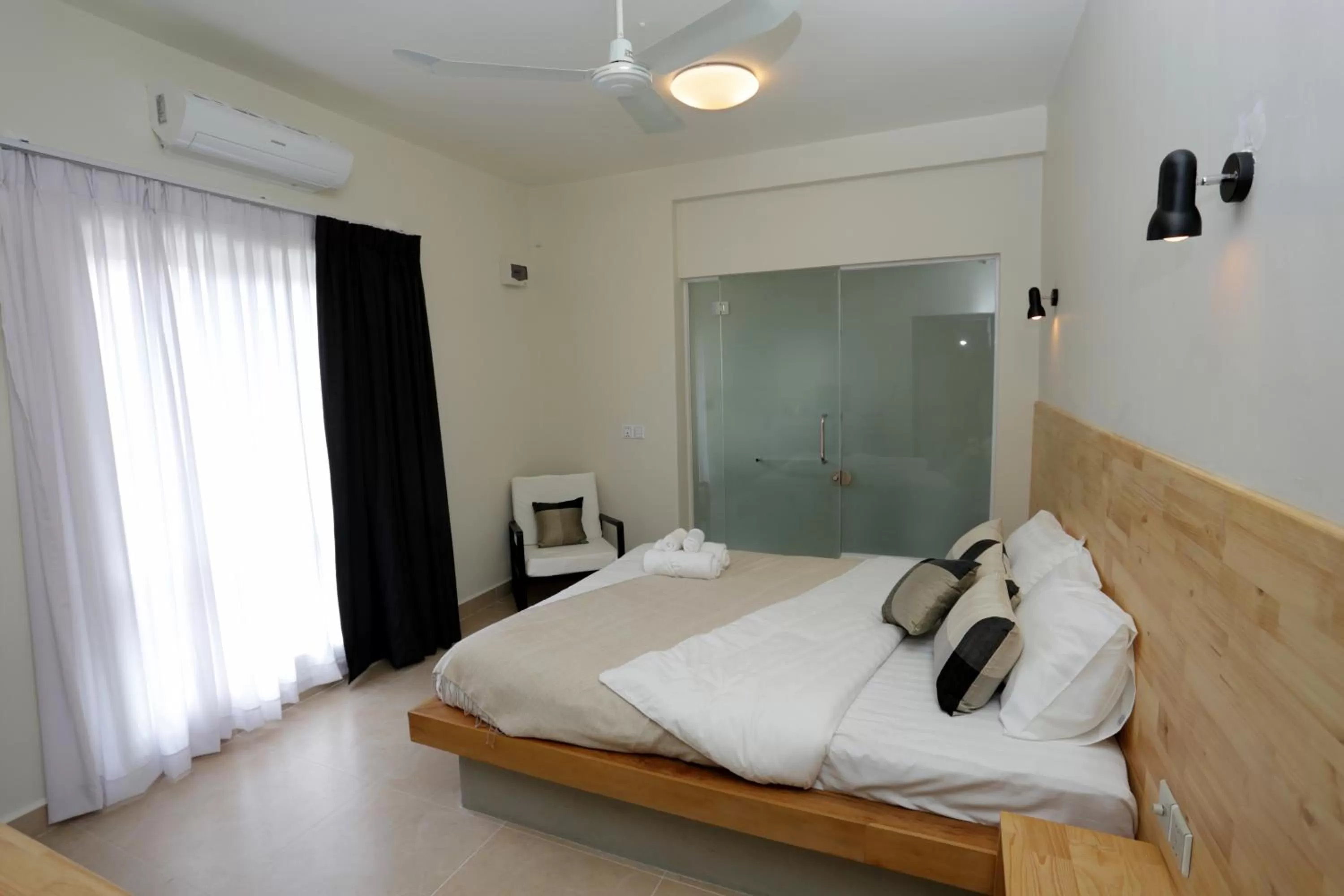 Photo of the whole room, Bed in Bamboo9 Boutique