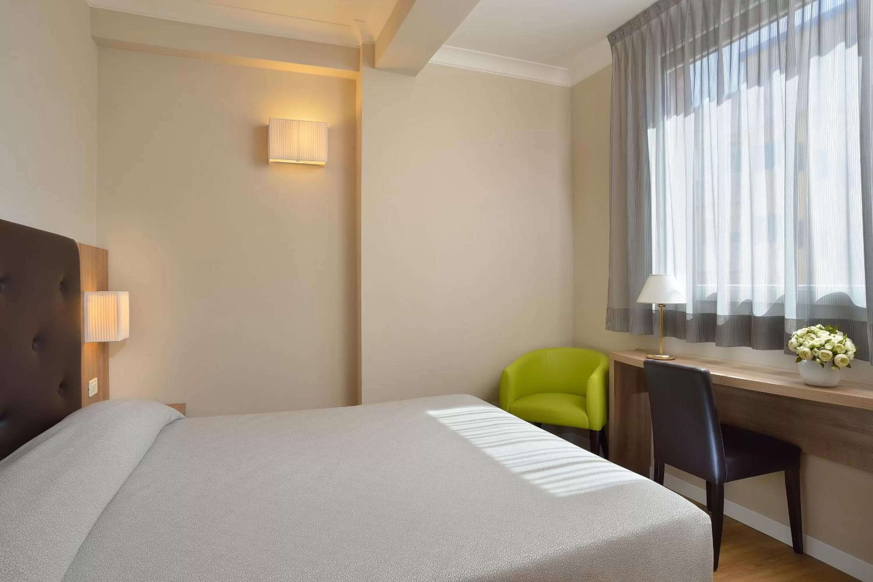 Bed in Hotel Rossini