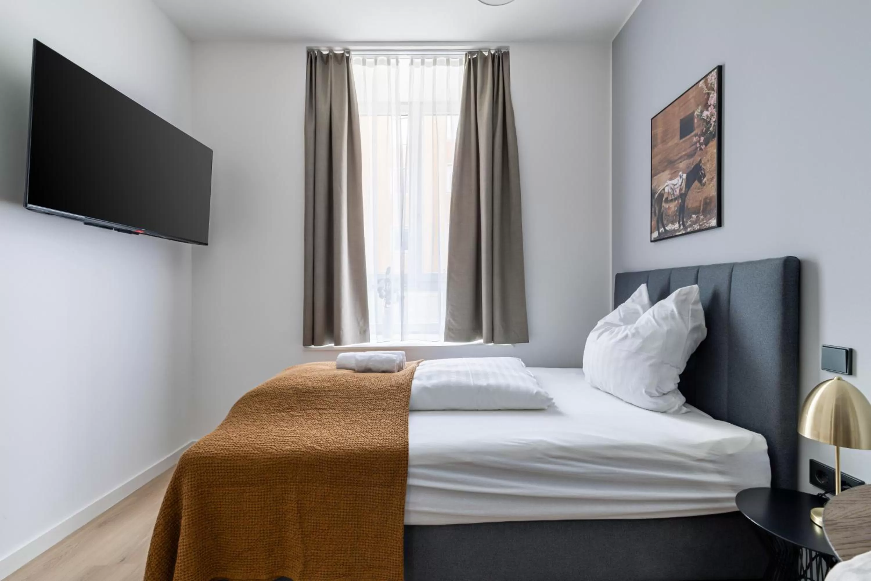 Bed in Limehome Rosenheim Gillitzerstraße